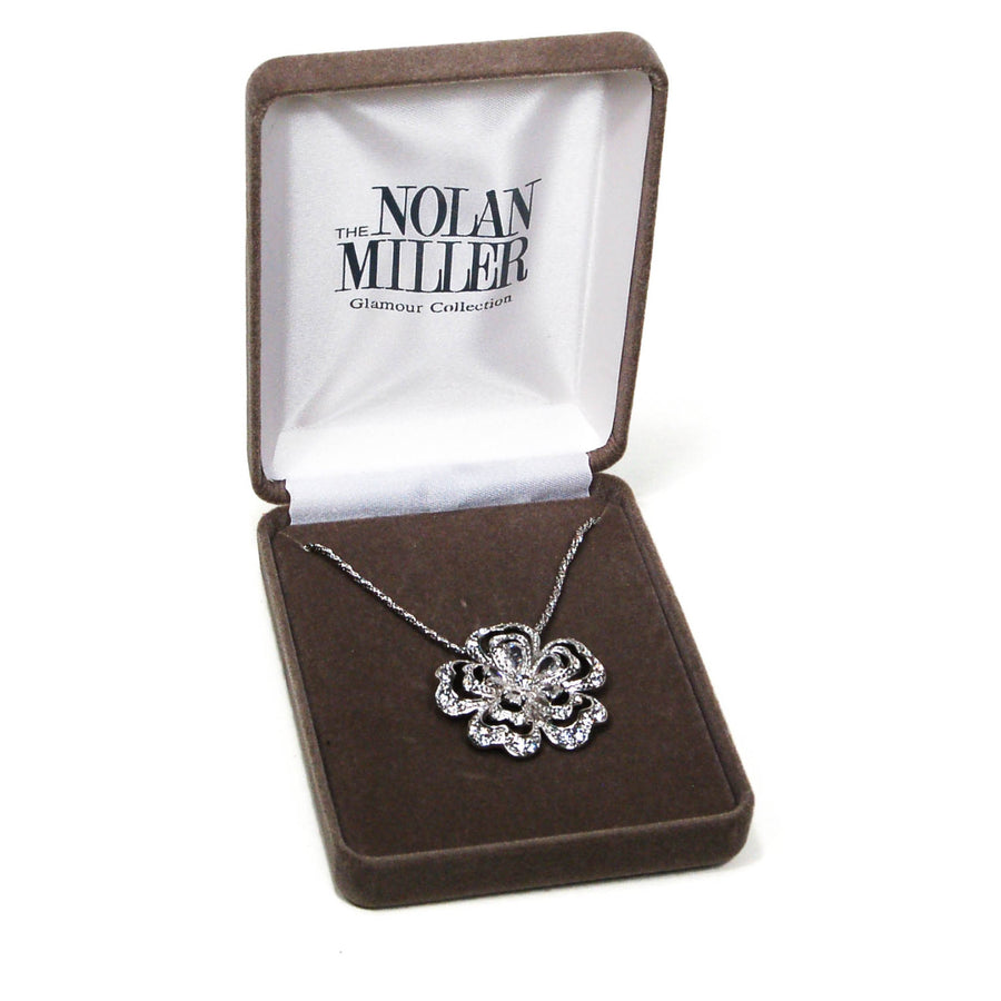 Sparkling Cubic Zirconia Flower Pendant Necklace by Nolan Miller by vintagemeetmodern - Vintage Meet Modern Vintage Jewelry - Chicago, Illinois - #oldhollywoodglamour #vintagemeetmodern #designervintage #jewelrybox #antiquejewelry #vintagejewelry