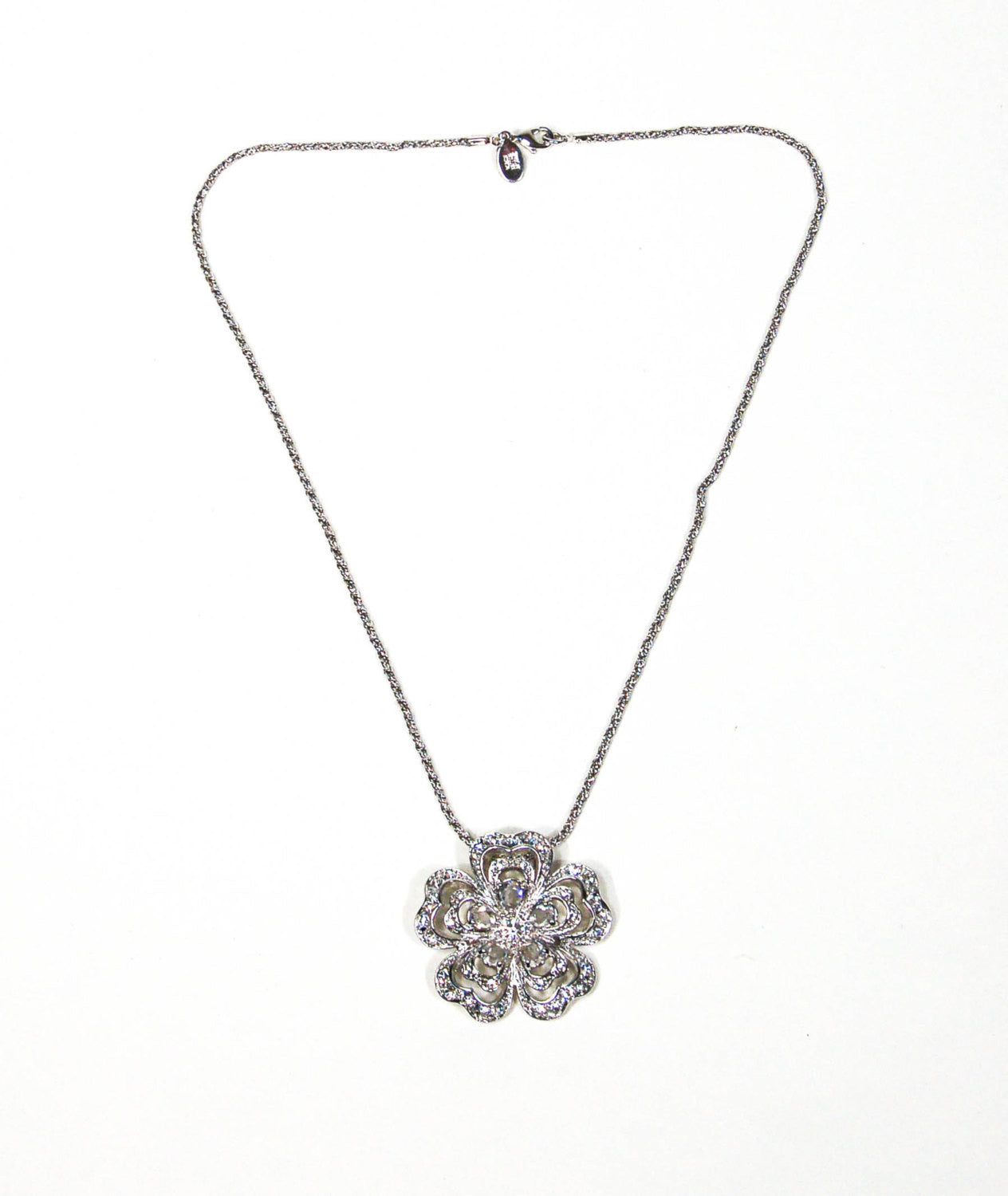 Sparkling Cubic Zirconia Flower Pendant Necklace by Nolan Miller by vintagemeetmodern - Vintage Meet Modern Vintage Jewelry - Chicago, Illinois - #oldhollywoodglamour #vintagemeetmodern #designervintage #jewelrybox #antiquejewelry #vintagejewelry