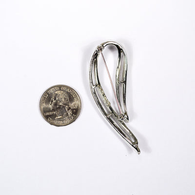 Sarah Coventry Silver Brooch, Open Wave Design, 1970s Designer Jewelry by Sarah Coventry - Vintage Meet Modern Vintage Jewelry - Chicago, Illinois - #oldhollywoodglamour #vintagemeetmodern #designervintage #jewelrybox #antiquejewelry #vintagejewelry