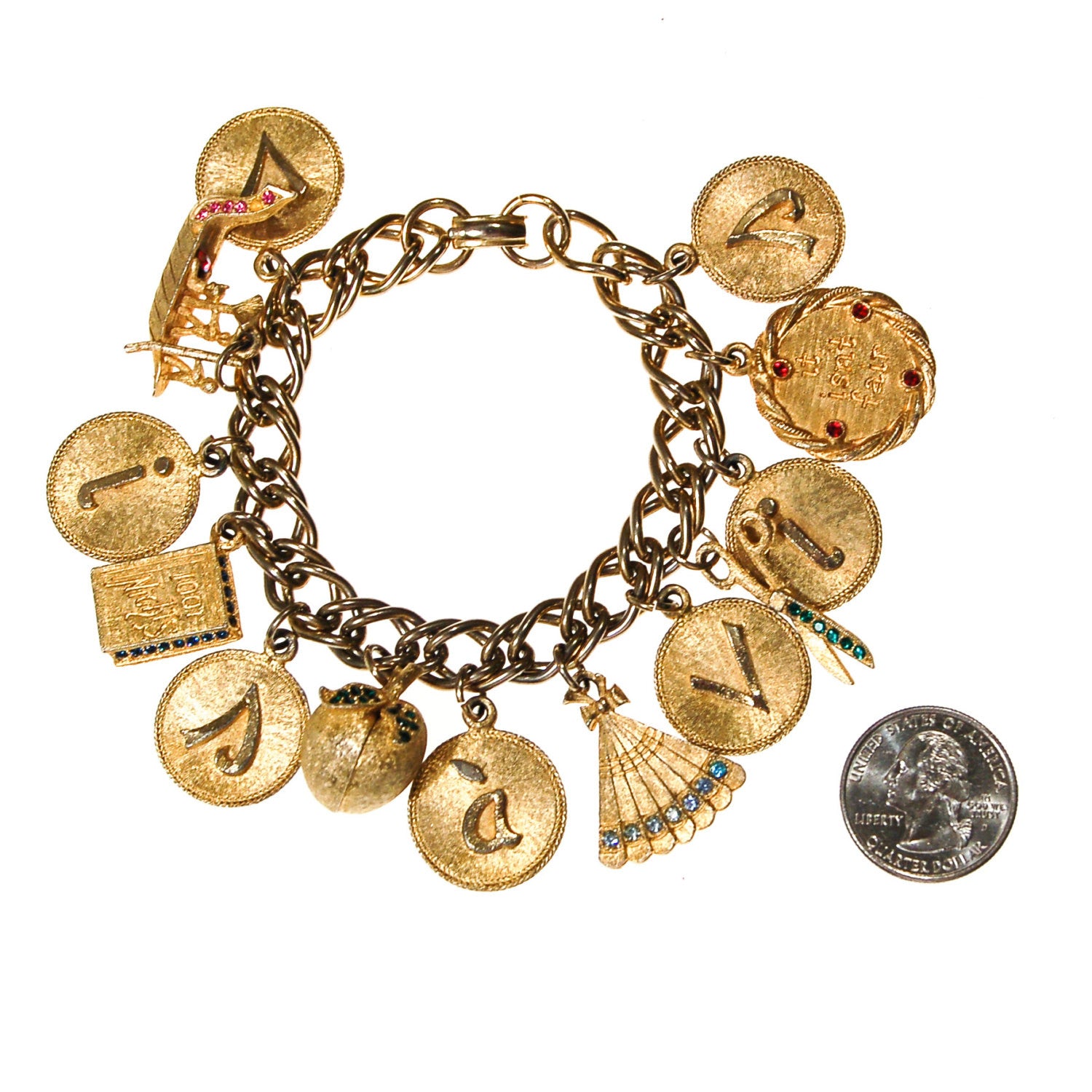Mid Century Modern Loaded Retro Charm Bracelet by Unsigned Beauty - Vintage Meet Modern Vintage Jewelry - Chicago, Illinois - #oldhollywoodglamour #vintagemeetmodern #designervintage #jewelrybox #antiquejewelry #vintagejewelry