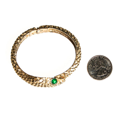 Gold Snake Bracelet with Emerald Green Eyes by Unsigned Beauty - Vintage Meet Modern Vintage Jewelry - Chicago, Illinois - #oldhollywoodglamour #vintagemeetmodern #designervintage #jewelrybox #antiquejewelry #vintagejewelry