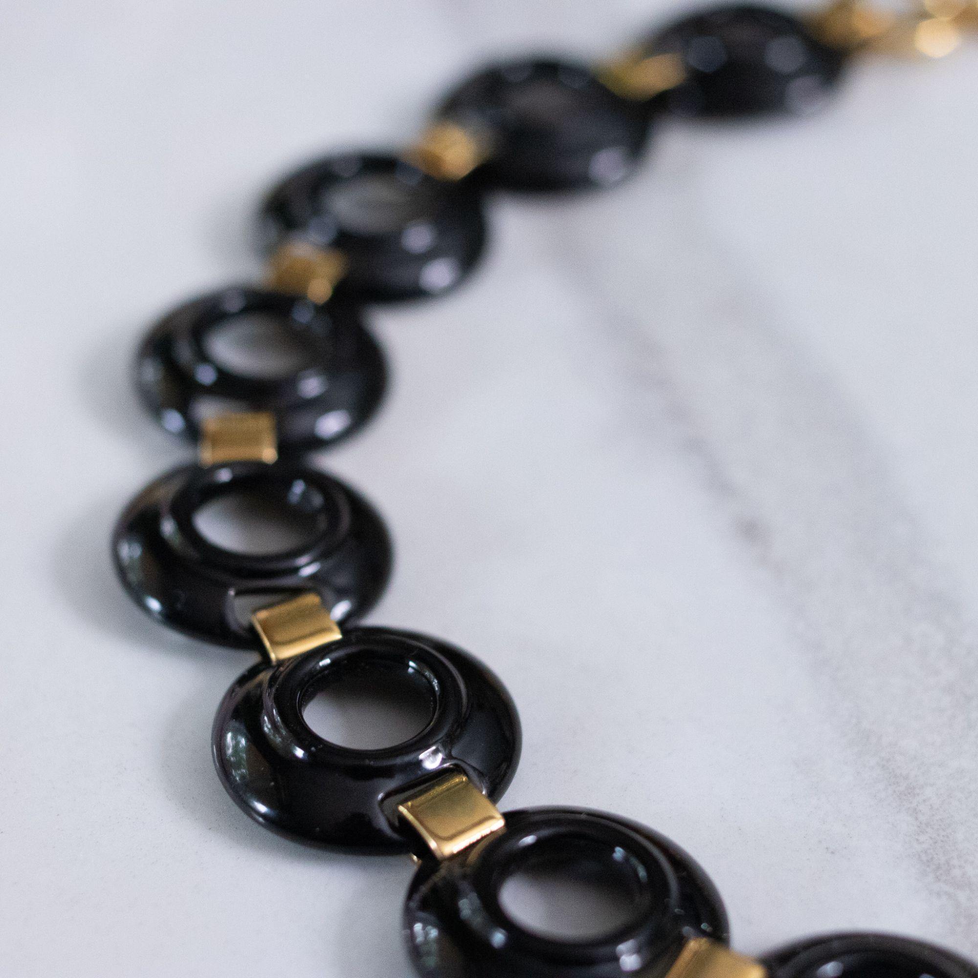 Vintage Monet Black Enameled Disc Necklace by Monet - Vintage Meet Modern Vintage Jewelry - Chicago, Illinois - #oldhollywoodglamour #vintagemeetmodern #designervintage #jewelrybox #antiquejewelry #vintagejewelry