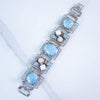 Vintage Chunky Silver Panel Bracelet with Turquoise Art Glass, Dragons Breath, and Opaline Glass Cabochons by Unsigned Beauty - Vintage Meet Modern Vintage Jewelry - Chicago, Illinois - #oldhollywoodglamour #vintagemeetmodern #designervintage #jewelrybox #antiquejewelry #vintagejewelry