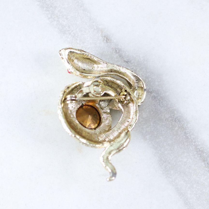Vintage Whiting and Davis Snake Brooch with Heliotrope Rhinestone by Whiting and Davis - Vintage Meet Modern Vintage Jewelry - Chicago, Illinois - #oldhollywoodglamour #vintagemeetmodern #designervintage #jewelrybox #antiquejewelry #vintagejewelry