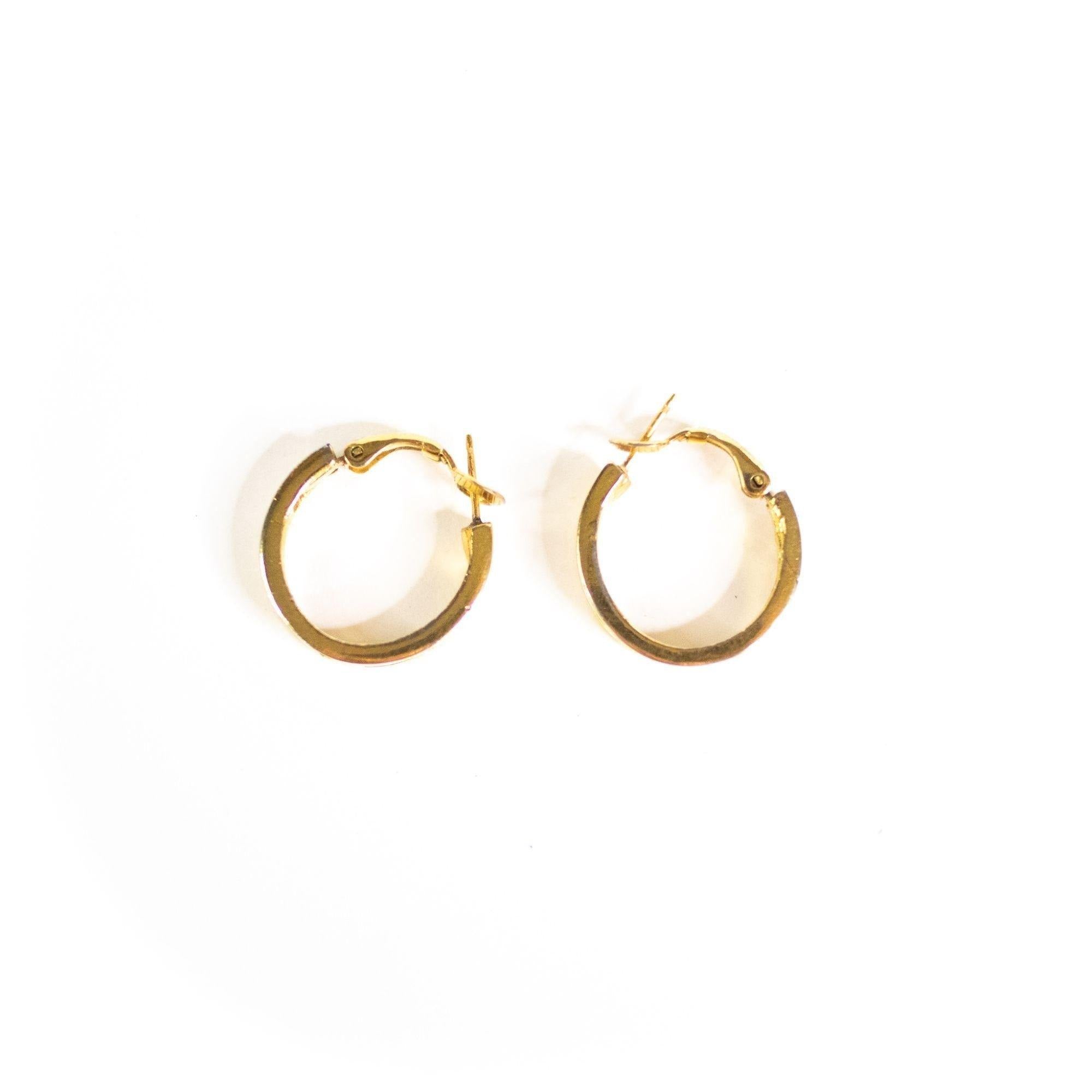 Crown Trifari Hoop Earrings by Crown Trifari - Vintage Meet Modern Vintage Jewelry - Chicago, Illinois - #oldhollywoodglamour #vintagemeetmodern #designervintage #jewelrybox #antiquejewelry #vintagejewelry