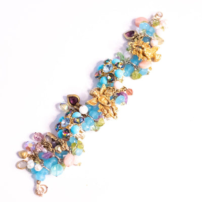 Vintage Kirks Folly Loaded Charm Bracelet with Cherubs, Crystals, Blue Turquoise Beads by Kirks Folly - Vintage Meet Modern Vintage Jewelry - Chicago, Illinois - #oldhollywoodglamour #vintagemeetmodern #designervintage #jewelrybox #antiquejewelry #vintagejewelry