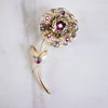 Vintage Sarah Coventry Gold Flower Brooch with Red Aurora Borealis Rhinestones by Sarah Coventry - Vintage Meet Modern Vintage Jewelry - Chicago, Illinois - #oldhollywoodglamour #vintagemeetmodern #designervintage #jewelrybox #antiquejewelry #vintagejewelry