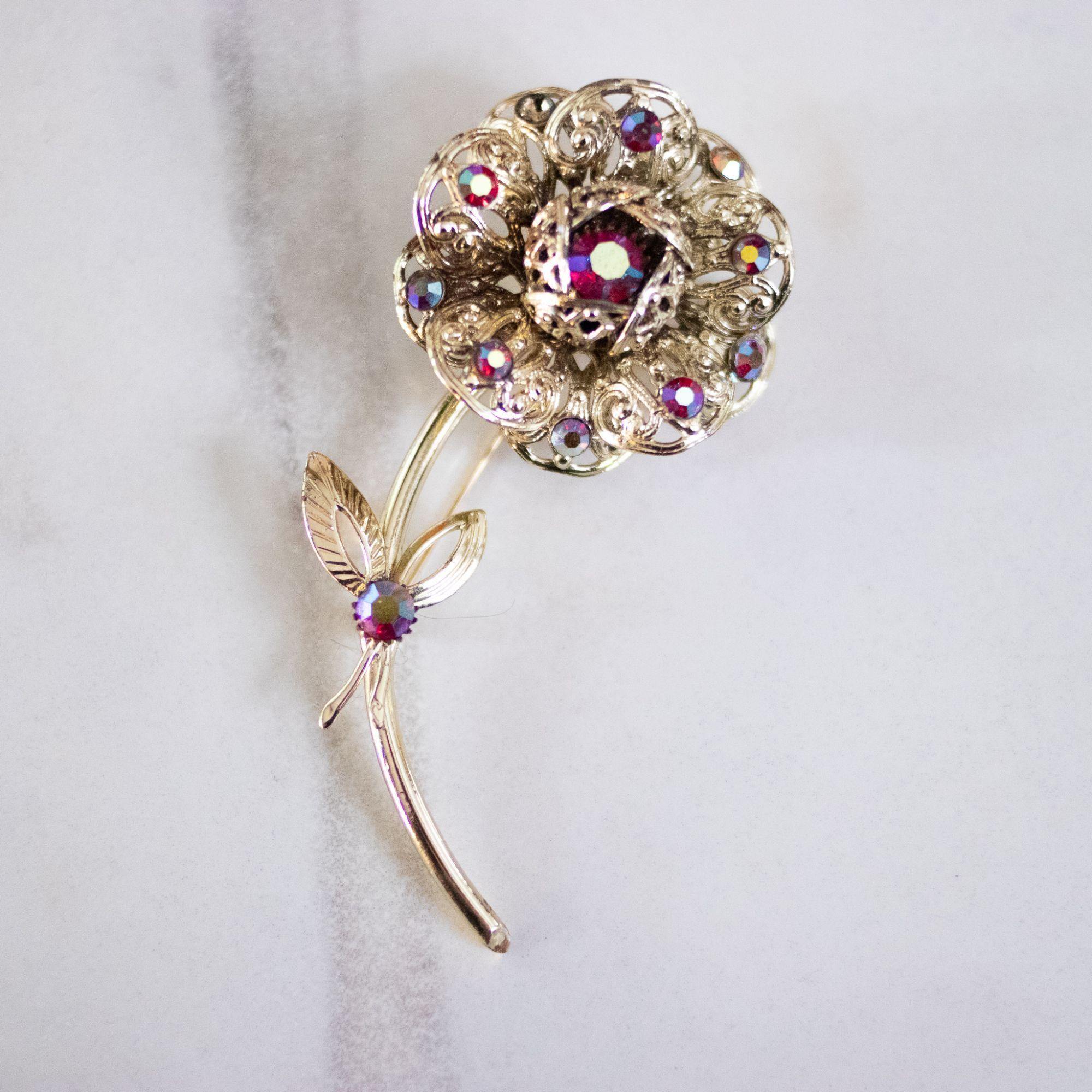 Vintage Sarah Coventry Gold Flower Brooch with Red Aurora Borealis Rhinestones by Sarah Coventry - Vintage Meet Modern Vintage Jewelry - Chicago, Illinois - #oldhollywoodglamour #vintagemeetmodern #designervintage #jewelrybox #antiquejewelry #vintagejewelry