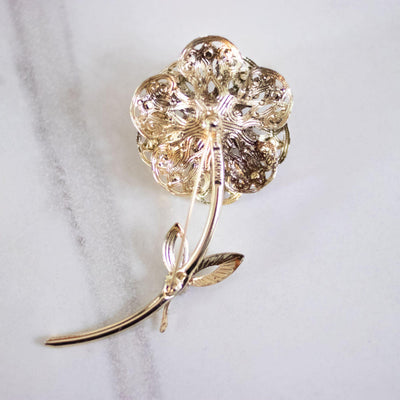 Vintage Sarah Coventry Gold Flower Brooch with Red Aurora Borealis Rhinestones by Sarah Coventry - Vintage Meet Modern Vintage Jewelry - Chicago, Illinois - #oldhollywoodglamour #vintagemeetmodern #designervintage #jewelrybox #antiquejewelry #vintagejewelry