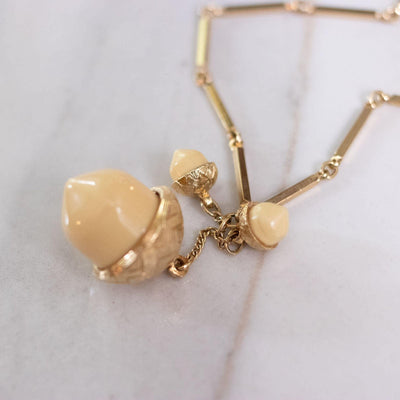 Vintage Cream Lucite Acorn Necklace by Unsigned Beauty - Vintage Meet Modern Vintage Jewelry - Chicago, Illinois - #oldhollywoodglamour #vintagemeetmodern #designervintage #jewelrybox #antiquejewelry #vintagejewelry