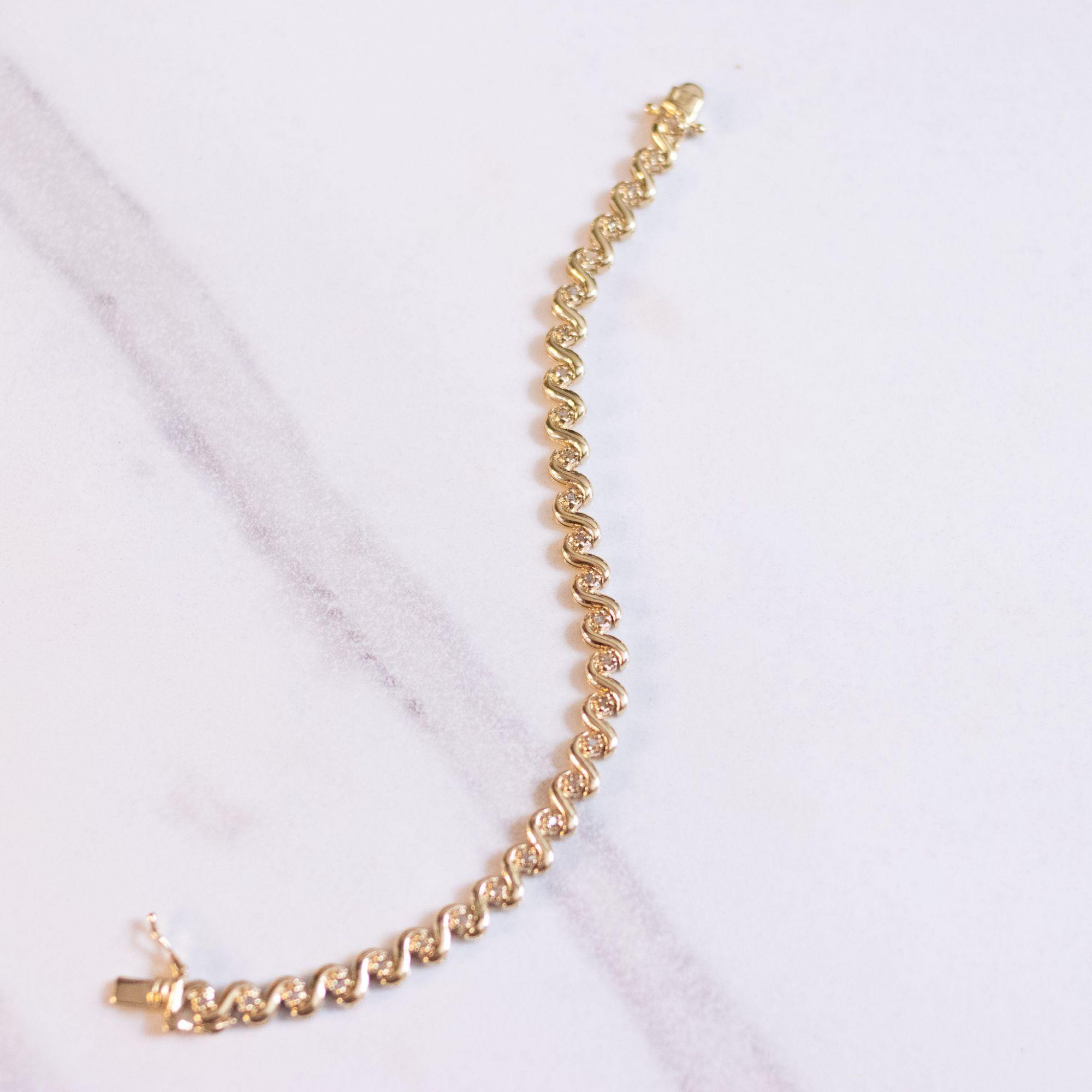 Vintage 18kt Gold Plated Tennis Bracelet with Cubic Zirconias by Unsigned Beauty - Vintage Meet Modern Vintage Jewelry - Chicago, Illinois - #oldhollywoodglamour #vintagemeetmodern #designervintage #jewelrybox #antiquejewelry #vintagejewelry