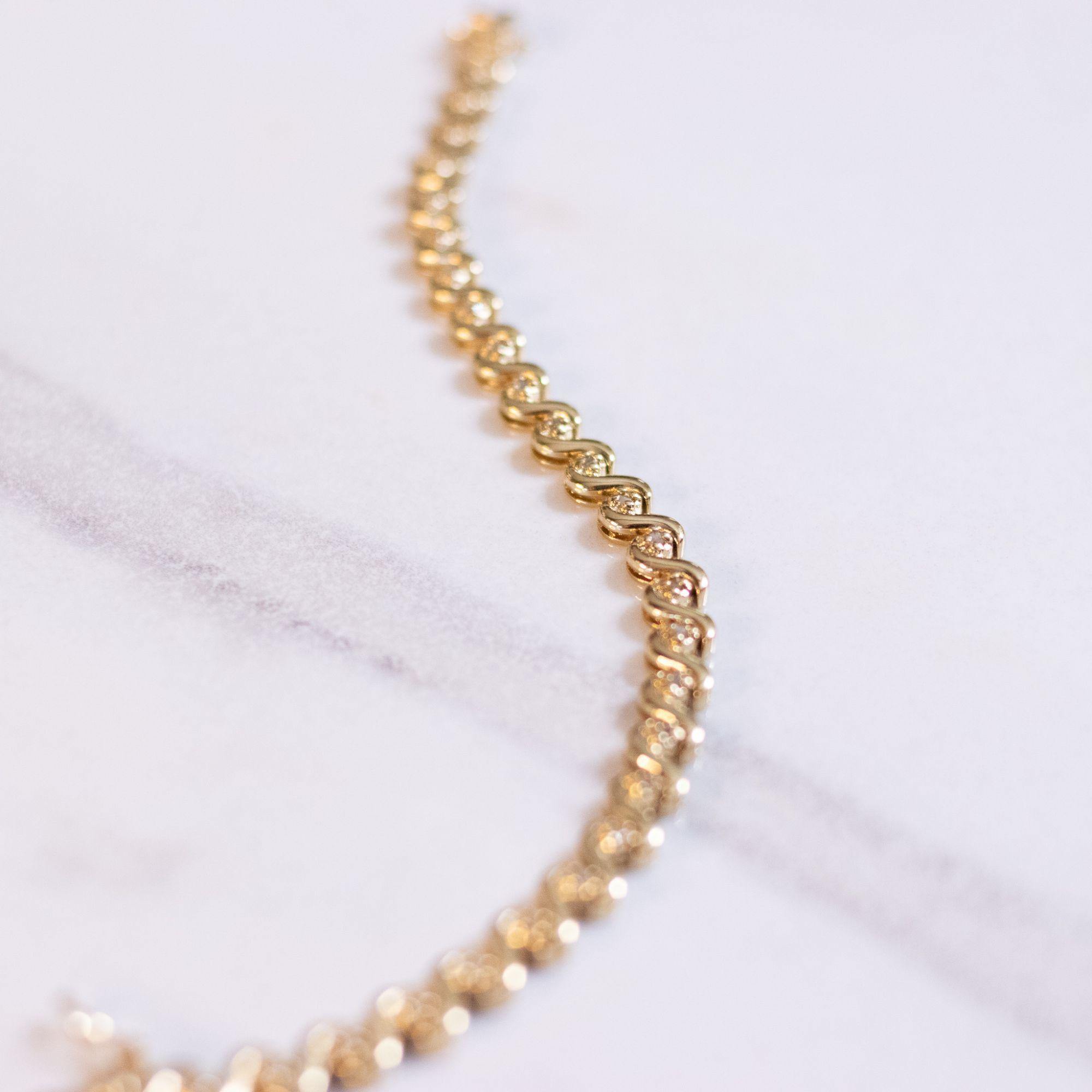 Vintage 18kt Gold Plated Tennis Bracelet with Cubic Zirconias by Unsigned Beauty - Vintage Meet Modern Vintage Jewelry - Chicago, Illinois - #oldhollywoodglamour #vintagemeetmodern #designervintage #jewelrybox #antiquejewelry #vintagejewelry