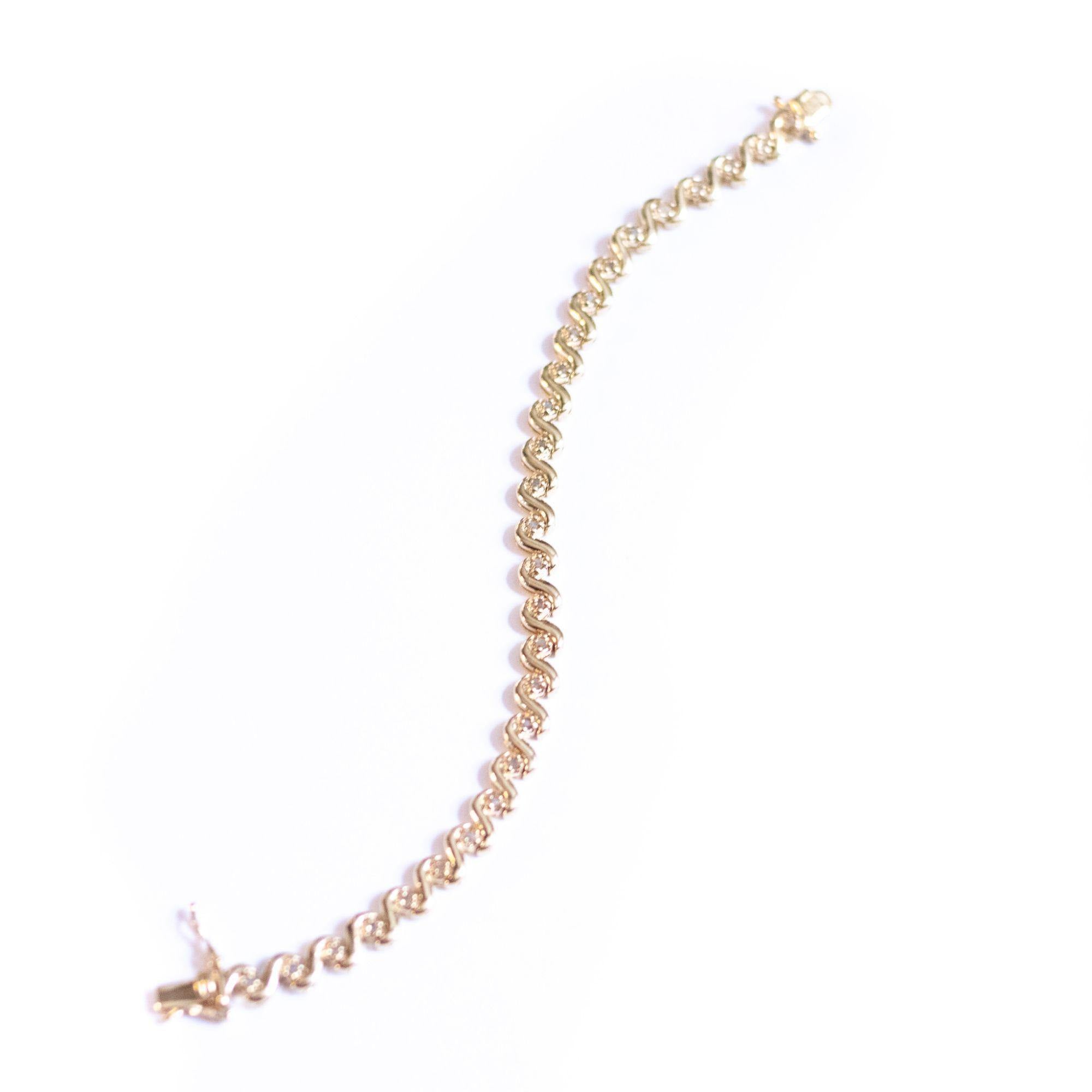 Vintage 18kt Gold Plated Tennis Bracelet with Cubic Zirconias by Unsigned Beauty - Vintage Meet Modern Vintage Jewelry - Chicago, Illinois - #oldhollywoodglamour #vintagemeetmodern #designervintage #jewelrybox #antiquejewelry #vintagejewelry