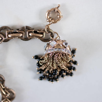 Chunky Brass Gilt Chain Bracelet with Diamante Rhinestone Domed Cap with Chain and Black Bead Tassels by Unsigned Beauty - Vintage Meet Modern Vintage Jewelry - Chicago, Illinois - #oldhollywoodglamour #vintagemeetmodern #designervintage #jewelrybox #antiquejewelry #vintagejewelry