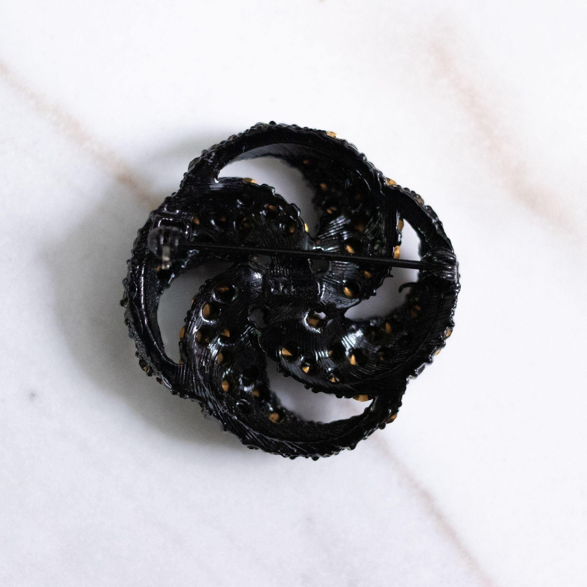 Vintage Jet Rhinestone Pinwheel Brooch by Vintage Meet Modern - Vintage Meet Modern Vintage Jewelry - Chicago, Illinois - #oldhollywoodglamour #vintagemeetmodern #designervintage #jewelrybox #antiquejewelry #vintagejewelry