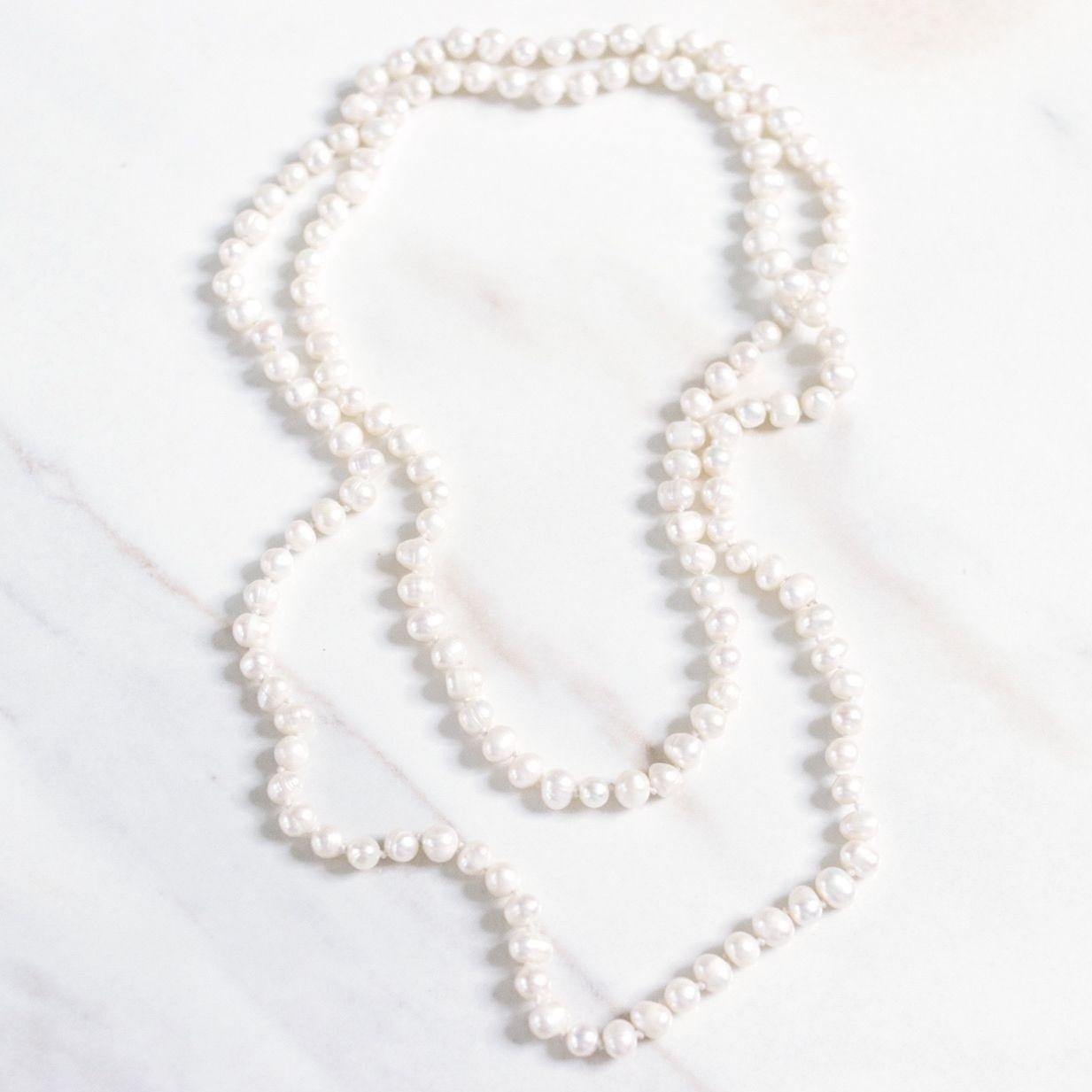 Vintage Cultured Pearl Infinity Strand Necklace by Unsigned Beauty - Vintage Meet Modern Vintage Jewelry - Chicago, Illinois - #oldhollywoodglamour #vintagemeetmodern #designervintage #jewelrybox #antiquejewelry #vintagejewelry