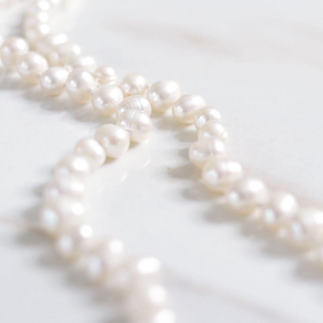 Vintage Cultured Pearl Infinity Strand Necklace by Unsigned Beauty - Vintage Meet Modern Vintage Jewelry - Chicago, Illinois - #oldhollywoodglamour #vintagemeetmodern #designervintage #jewelrybox #antiquejewelry #vintagejewelry