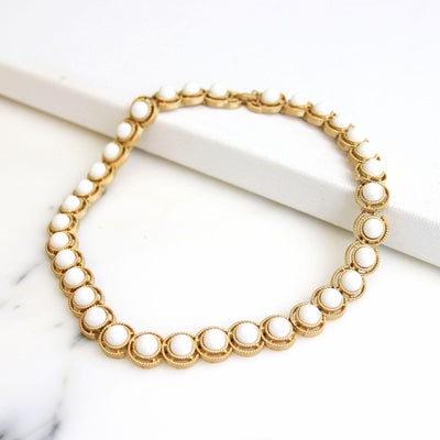 Vintage Crown Trifari White Cabochon and Gold Choker Necklace by Crown Trifari - Vintage Meet Modern Vintage Jewelry - Chicago, Illinois - #oldhollywoodglamour #vintagemeetmodern #designervintage #jewelrybox #antiquejewelry #vintagejewelry