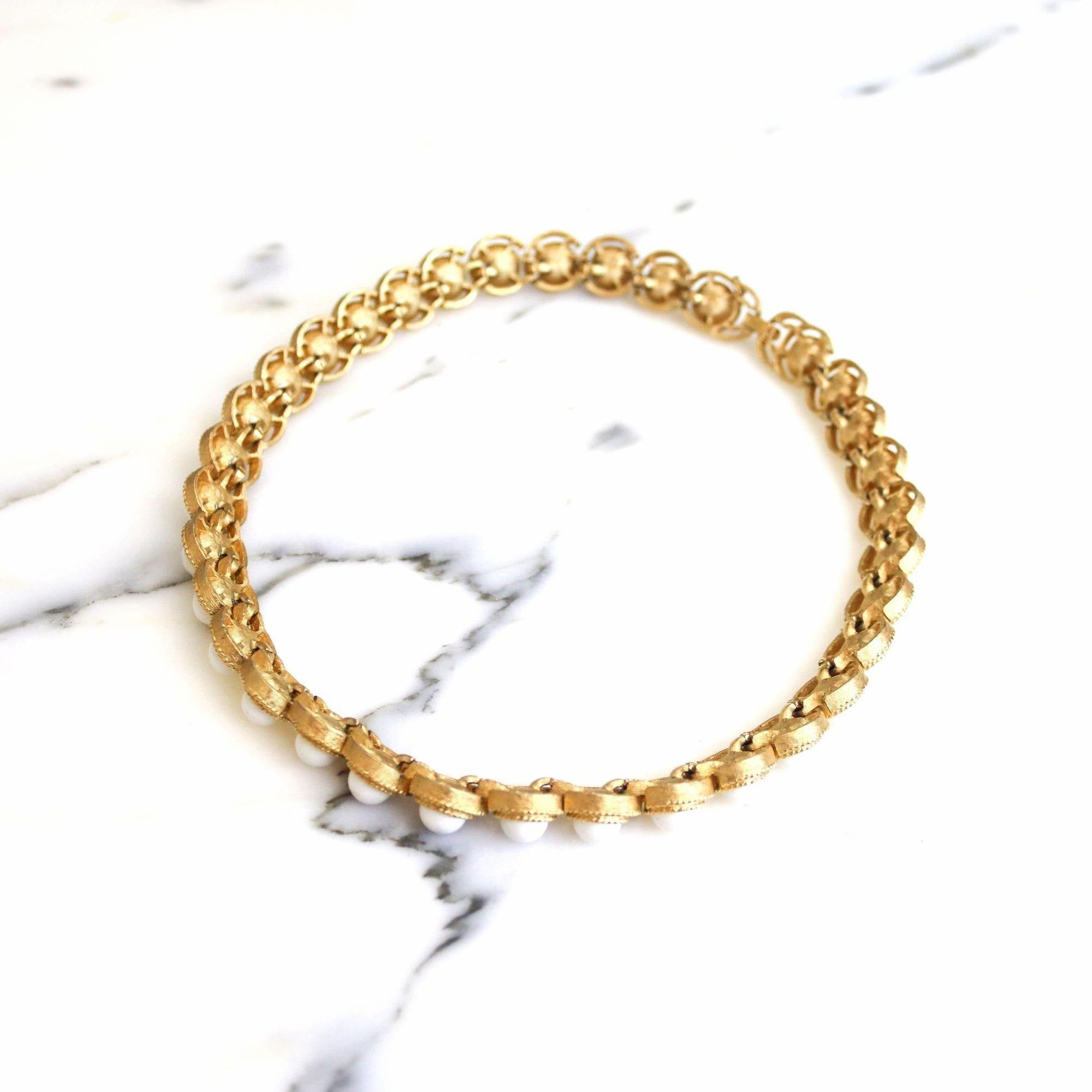 Vintage Crown Trifari White Cabochon and Gold Choker Necklace by Crown Trifari - Vintage Meet Modern Vintage Jewelry - Chicago, Illinois - #oldhollywoodglamour #vintagemeetmodern #designervintage #jewelrybox #antiquejewelry #vintagejewelry