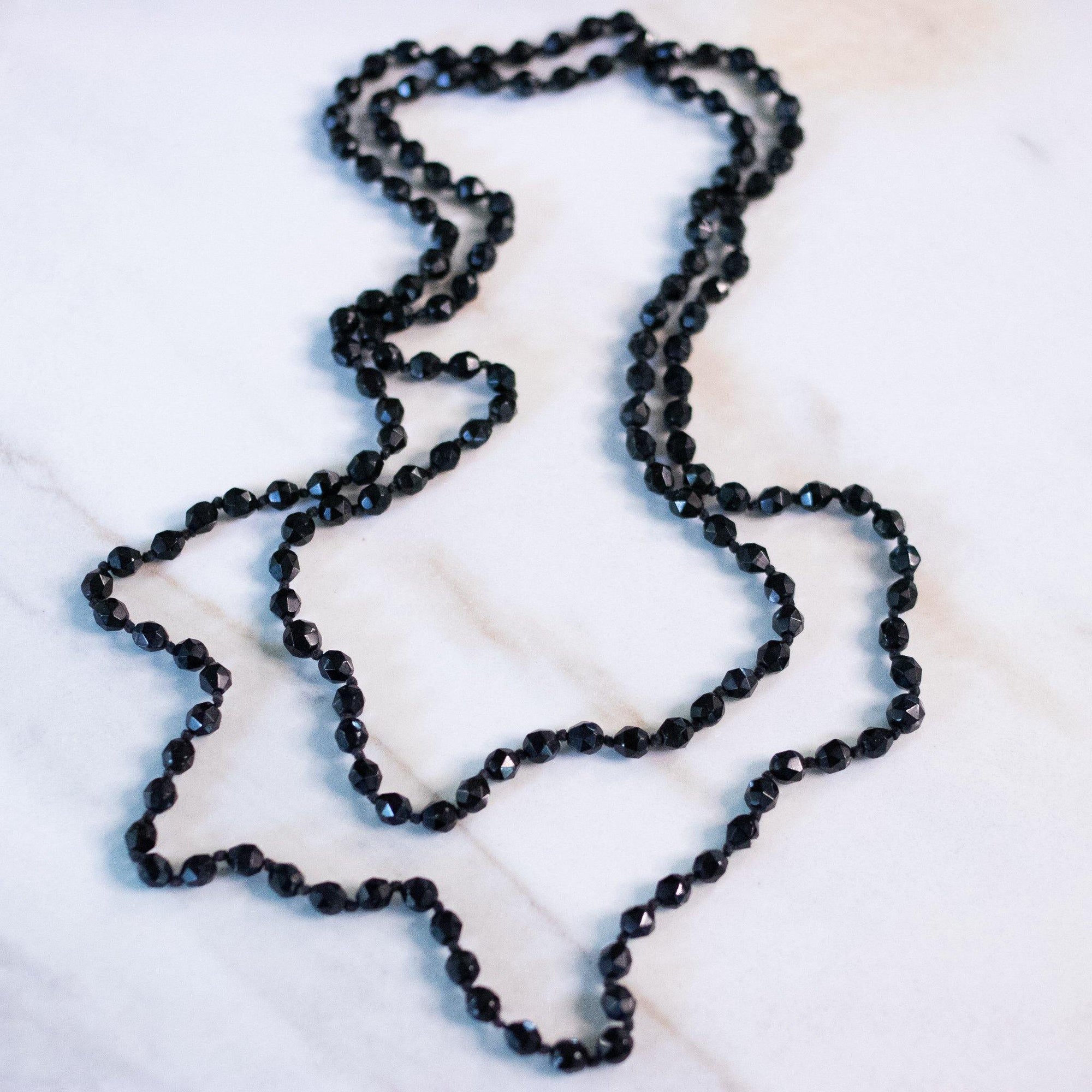 Vintage Czech Hand-Knotted Jet Glass Bead Flapper Necklace by Czech - Vintage Meet Modern Vintage Jewelry - Chicago, Illinois - #oldhollywoodglamour #vintagemeetmodern #designervintage #jewelrybox #antiquejewelry #vintagejewelry