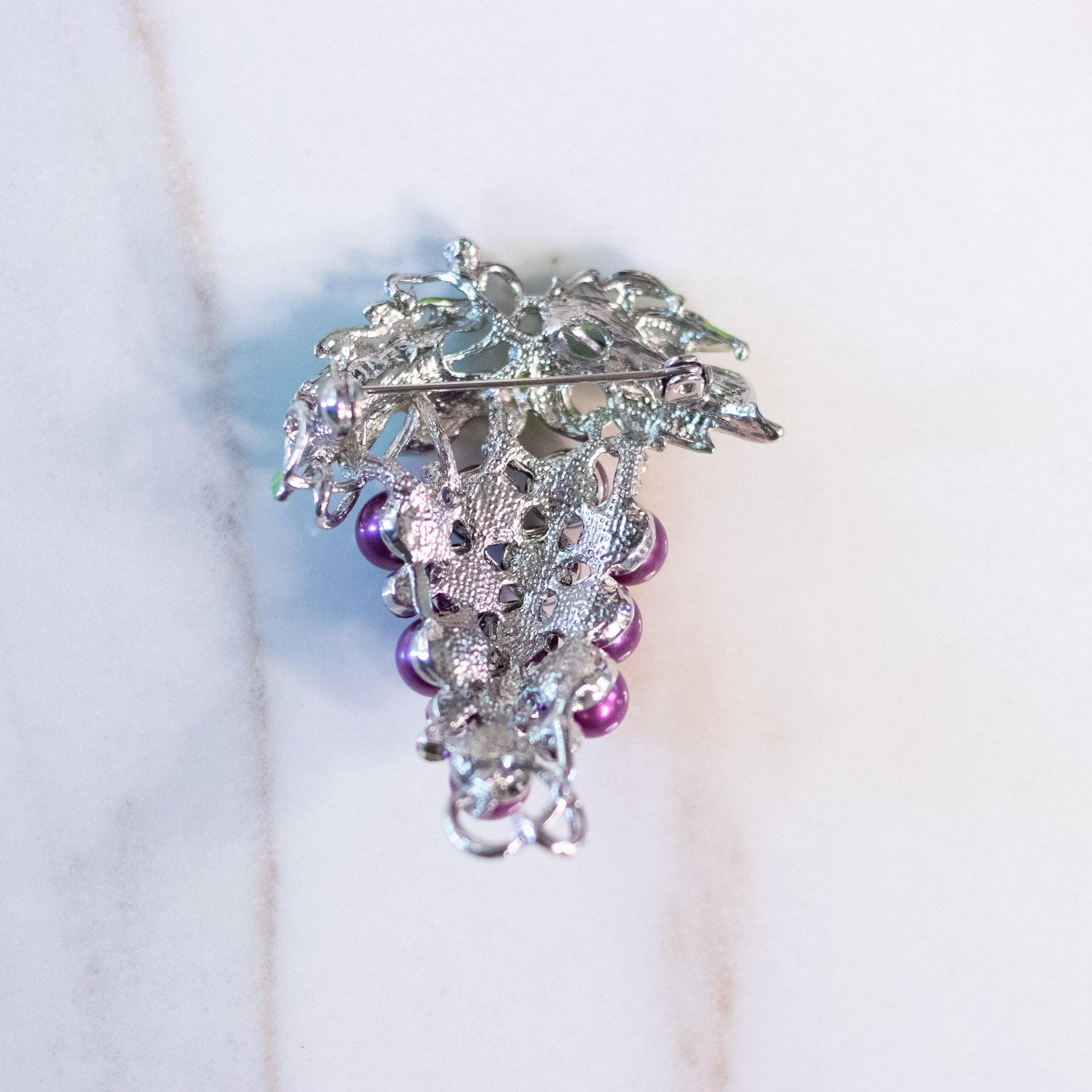 Vintage Grapes Brooch with Purple Pearls, Diamante Rhinestones, and Green Enamel Leaves by Unsigned Beauty - Vintage Meet Modern Vintage Jewelry - Chicago, Illinois - #oldhollywoodglamour #vintagemeetmodern #designervintage #jewelrybox #antiquejewelry #vintagejewelry