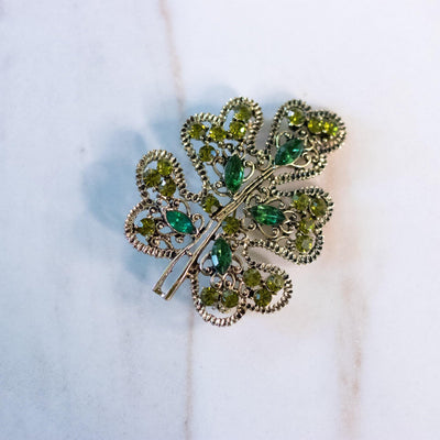 Vintage Green Rhinestone Leaf Brooch by Unsigned Beauty - Vintage Meet Modern Vintage Jewelry - Chicago, Illinois - #oldhollywoodglamour #vintagemeetmodern #designervintage #jewelrybox #antiquejewelry #vintagejewelry