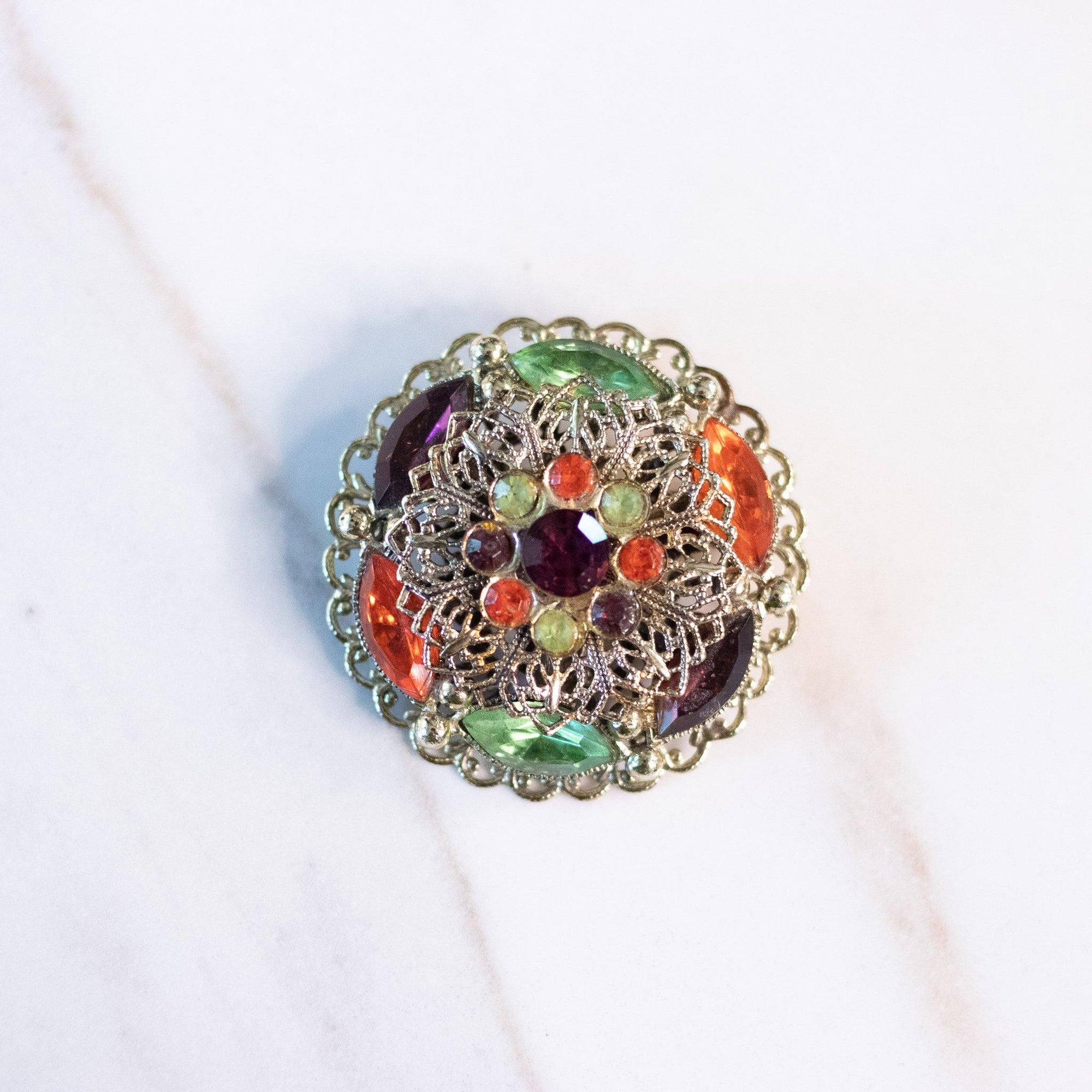 Vintage Green, Purple, and Orange Rhinestone Filigree Medallion Brooch by West Germany - Vintage Meet Modern Vintage Jewelry - Chicago, Illinois - #oldhollywoodglamour #vintagemeetmodern #designervintage #jewelrybox #antiquejewelry #vintagejewelry