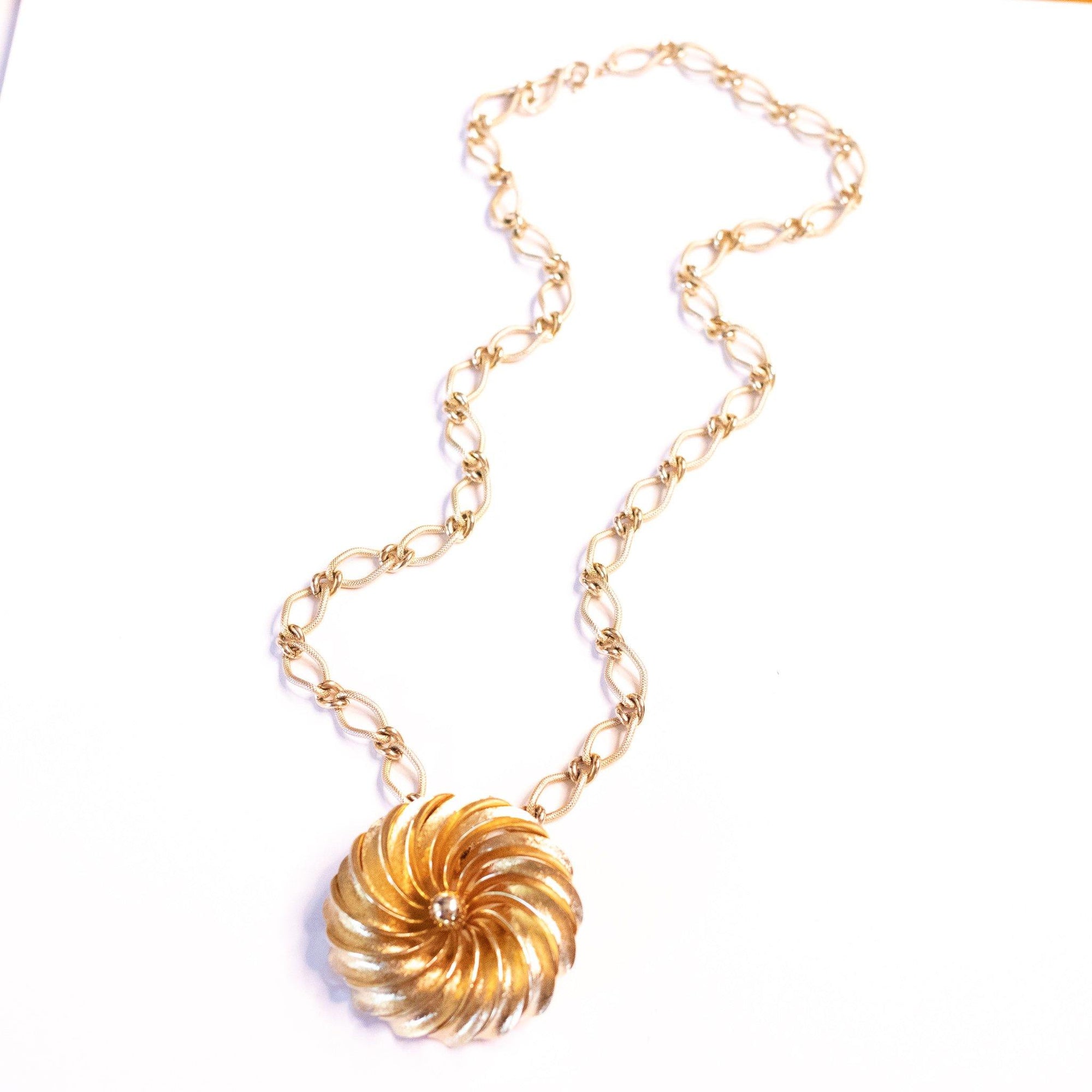 Vintage Mid Century Modern Gold Spiral Medallion Brooch/Pendant Necklace by Unsigned Beauty - Vintage Meet Modern Vintage Jewelry - Chicago, Illinois - #oldhollywoodglamour #vintagemeetmodern #designervintage #jewelrybox #antiquejewelry #vintagejewelry