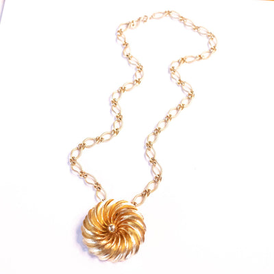 Vintage Mid Century Modern Gold Spiral Medallion Brooch/Pendant Necklace by Unsigned Beauty - Vintage Meet Modern Vintage Jewelry - Chicago, Illinois - #oldhollywoodglamour #vintagemeetmodern #designervintage #jewelrybox #antiquejewelry #vintagejewelry