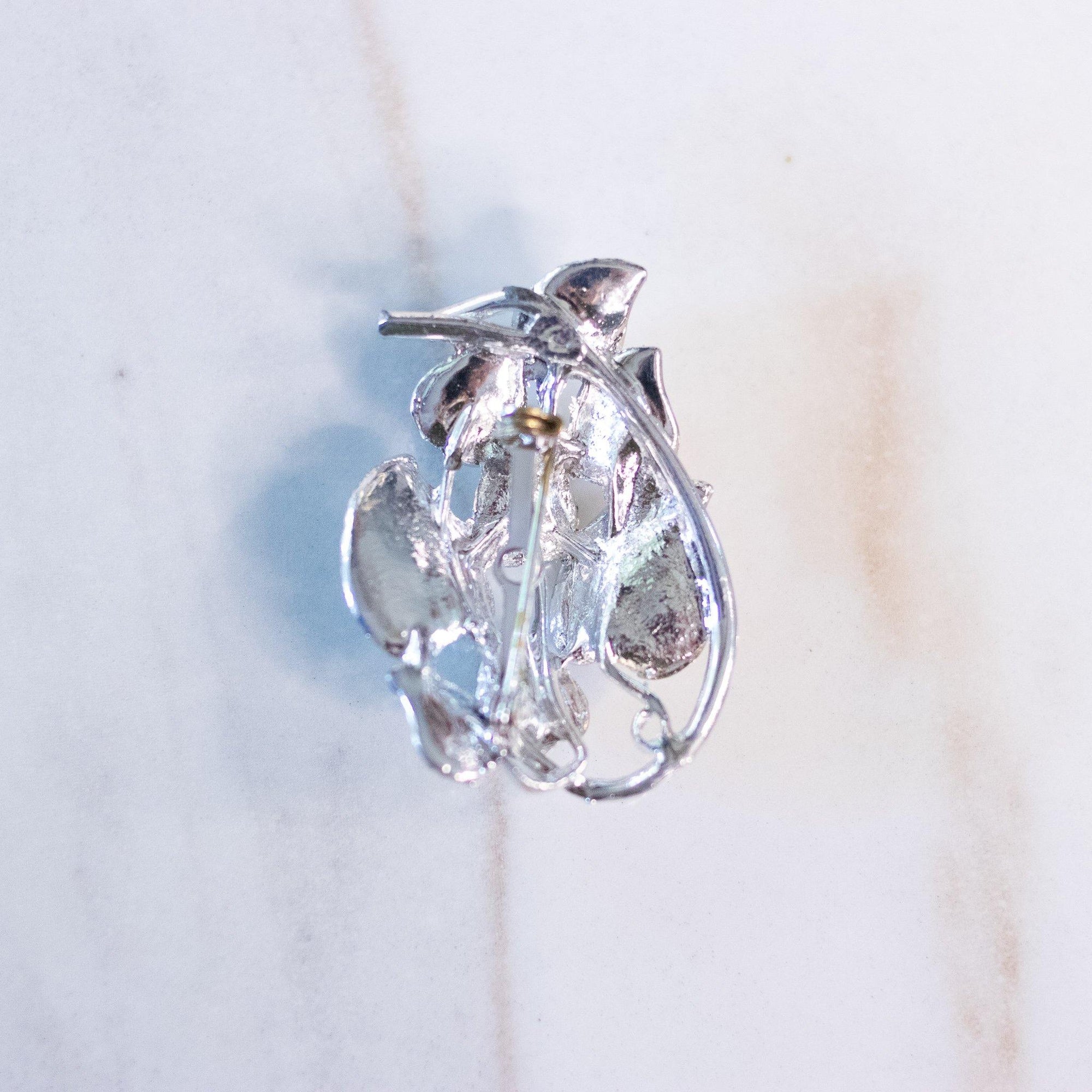 Vintage Mid Century Modern Silver Leaf Cluster Brooch with Lavender Rhinestones by Unsigned Beauty - Vintage Meet Modern Vintage Jewelry - Chicago, Illinois - #oldhollywoodglamour #vintagemeetmodern #designervintage #jewelrybox #antiquejewelry #vintagejewelry