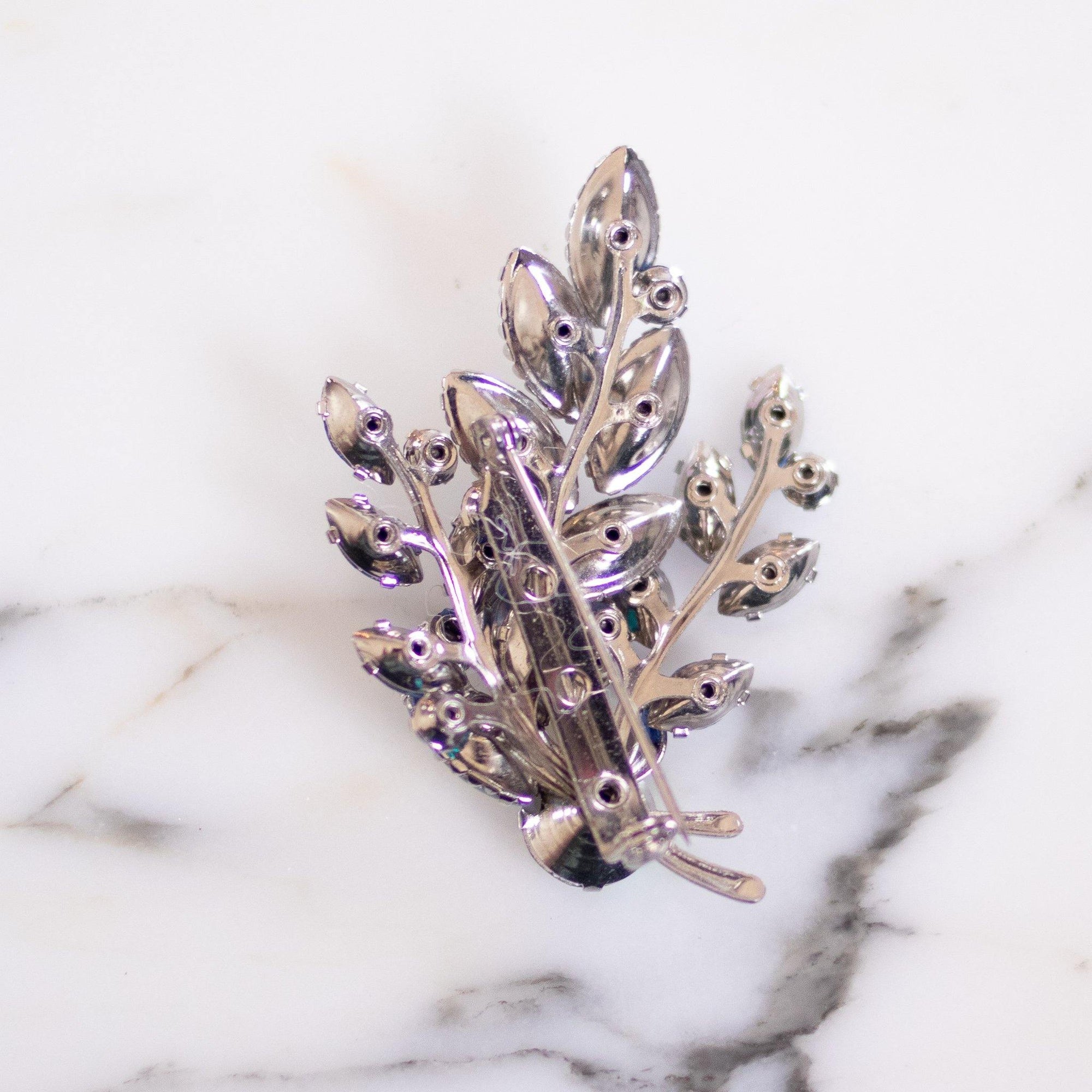 Vintage 1950s Light Blue Rhinestone Spray Style Brooch by Unsigned Beauty - Vintage Meet Modern Vintage Jewelry - Chicago, Illinois - #oldhollywoodglamour #vintagemeetmodern #designervintage #jewelrybox #antiquejewelry #vintagejewelry