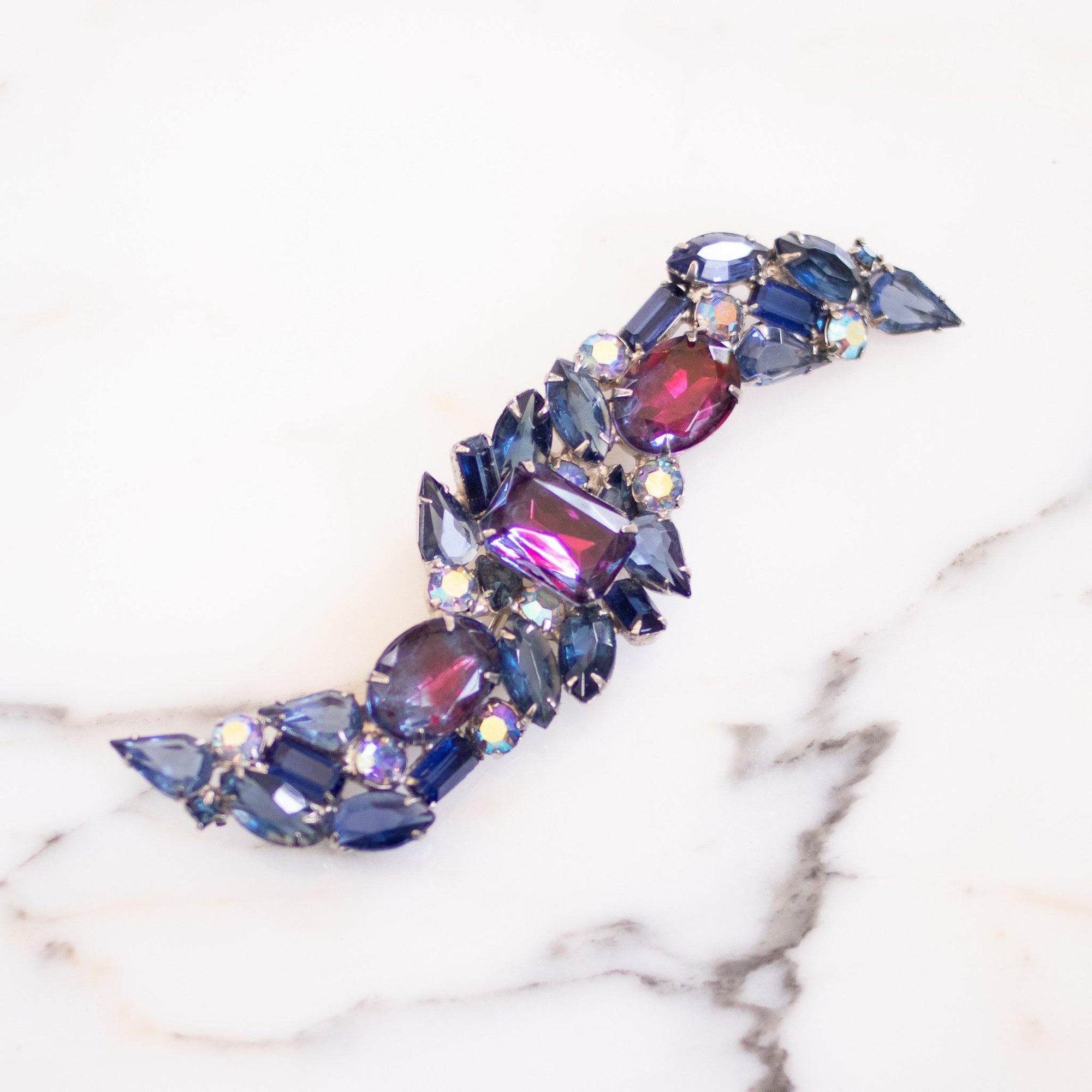 Vintage Juliana Large East West Style Blue and Purple Rhinestone Statement Brooch by Vintage Meet Modern - Vintage Meet Modern Vintage Jewelry - Chicago, Illinois - #oldhollywoodglamour #vintagemeetmodern #designervintage #jewelrybox #antiquejewelry #vintagejewelry