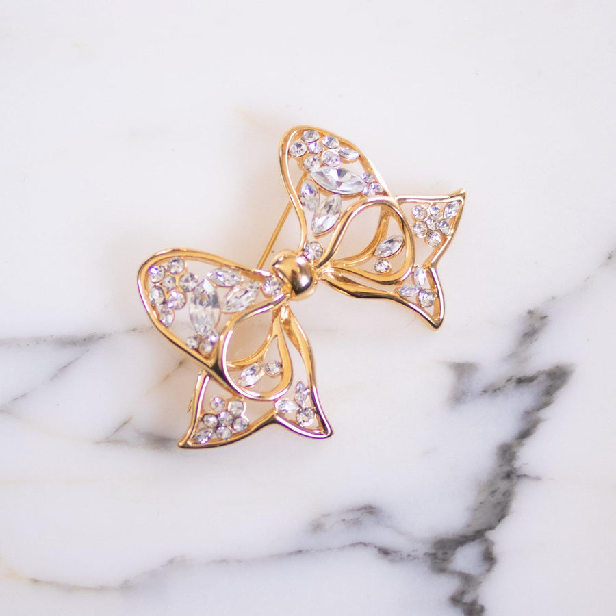 Vintage Nolan Miller Gold Bow with Rhinestones Brooch by Nolan Miller - Vintage Meet Modern Vintage Jewelry - Chicago, Illinois - #oldhollywoodglamour #vintagemeetmodern #designervintage #jewelrybox #antiquejewelry #vintagejewelry