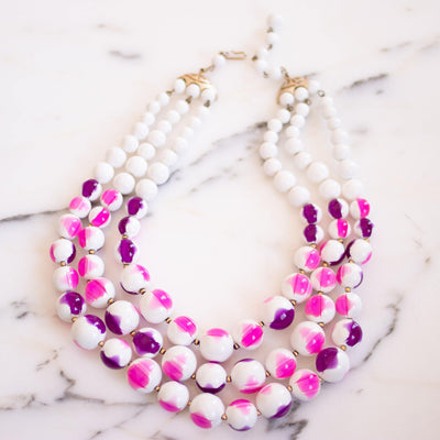 Vintage Chunky White with Pink and Purple Beaded Triple Strand Statement Necklace by Unsigned Beauty - Vintage Meet Modern Vintage Jewelry - Chicago, Illinois - #oldhollywoodglamour #vintagemeetmodern #designervintage #jewelrybox #antiquejewelry #vintagejewelry