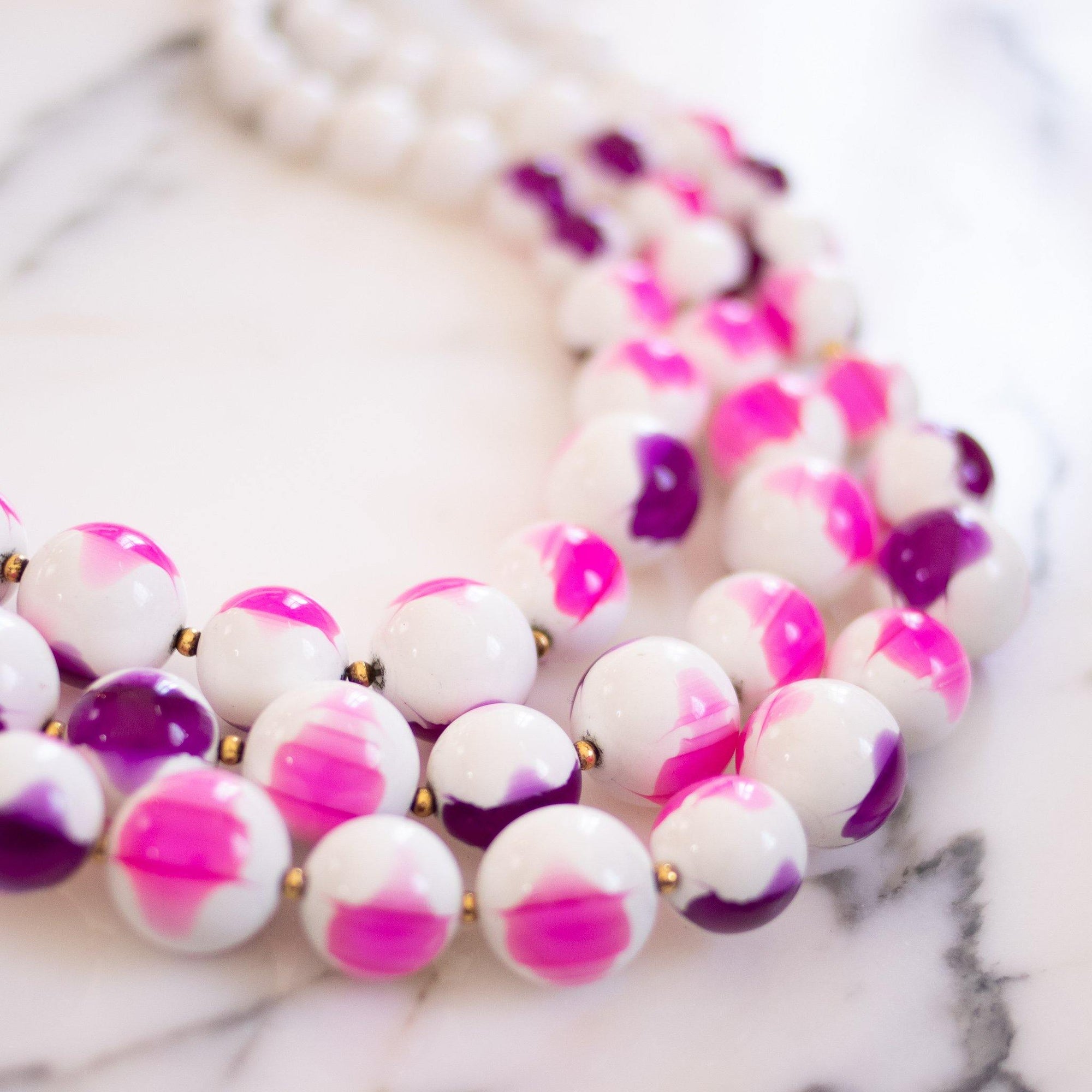 Vintage Chunky White with Pink and Purple Beaded Triple Strand Statement Necklace by Unsigned Beauty - Vintage Meet Modern Vintage Jewelry - Chicago, Illinois - #oldhollywoodglamour #vintagemeetmodern #designervintage #jewelrybox #antiquejewelry #vintagejewelry