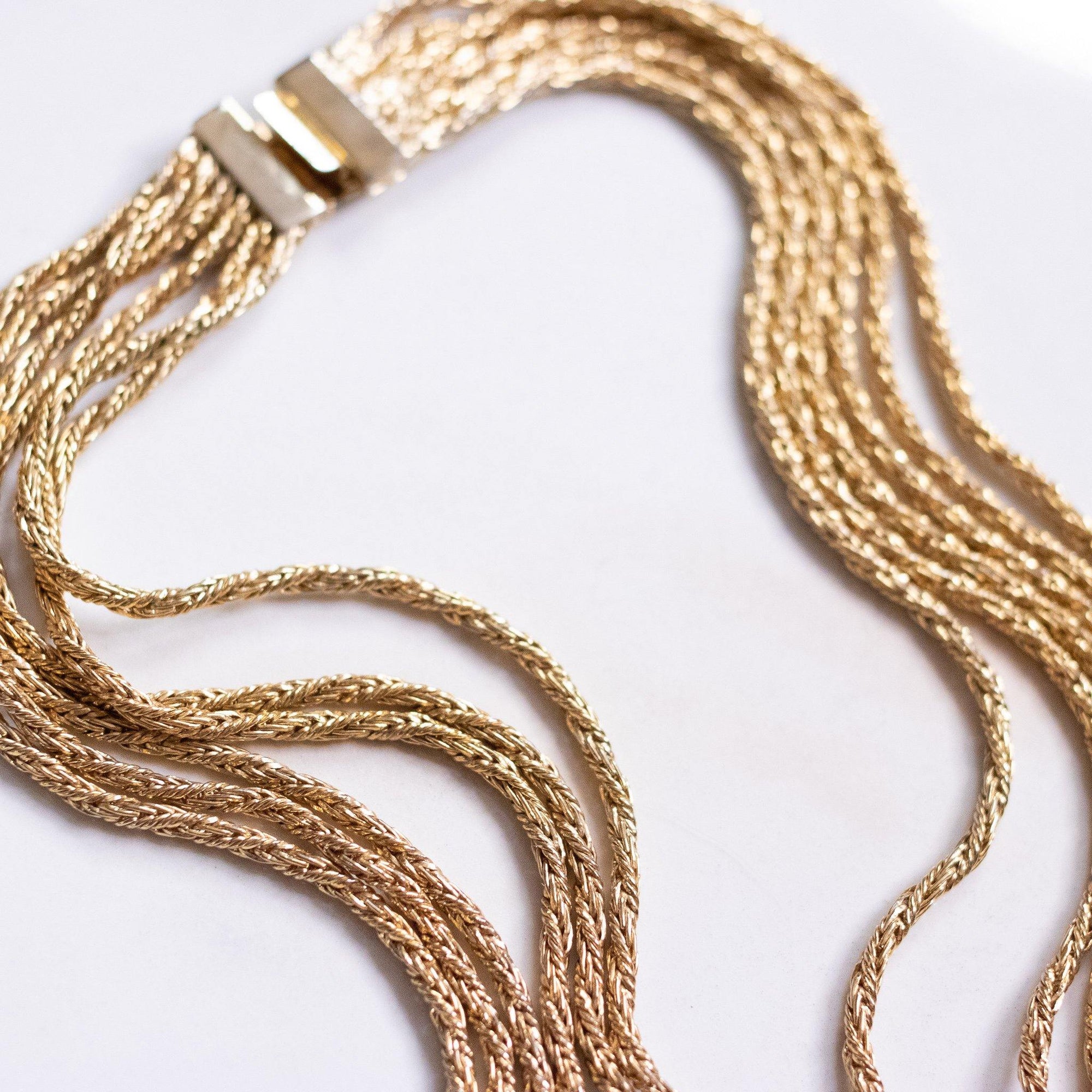 Vintage Emerald Green Rhinestone Tassel Necklace with Braided Rope Chain by Hobe - Vintage Meet Modern Vintage Jewelry - Chicago, Illinois - #oldhollywoodglamour #vintagemeetmodern #designervintage #jewelrybox #antiquejewelry #vintagejewelry