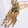 Vintage Emerald Green Rhinestone Tassel Necklace with Braided Rope Chain by Hobe - Vintage Meet Modern Vintage Jewelry - Chicago, Illinois - #oldhollywoodglamour #vintagemeetmodern #designervintage #jewelrybox #antiquejewelry #vintagejewelry