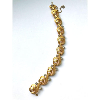 Vintage Mid Century Modern Era Gold Scroll Link Bracelet with Diamante Rhinestones by Unsigned Beauty - Vintage Meet Modern Vintage Jewelry - Chicago, Illinois - #oldhollywoodglamour #vintagemeetmodern #designervintage #jewelrybox #antiquejewelry #vintagejewelry
