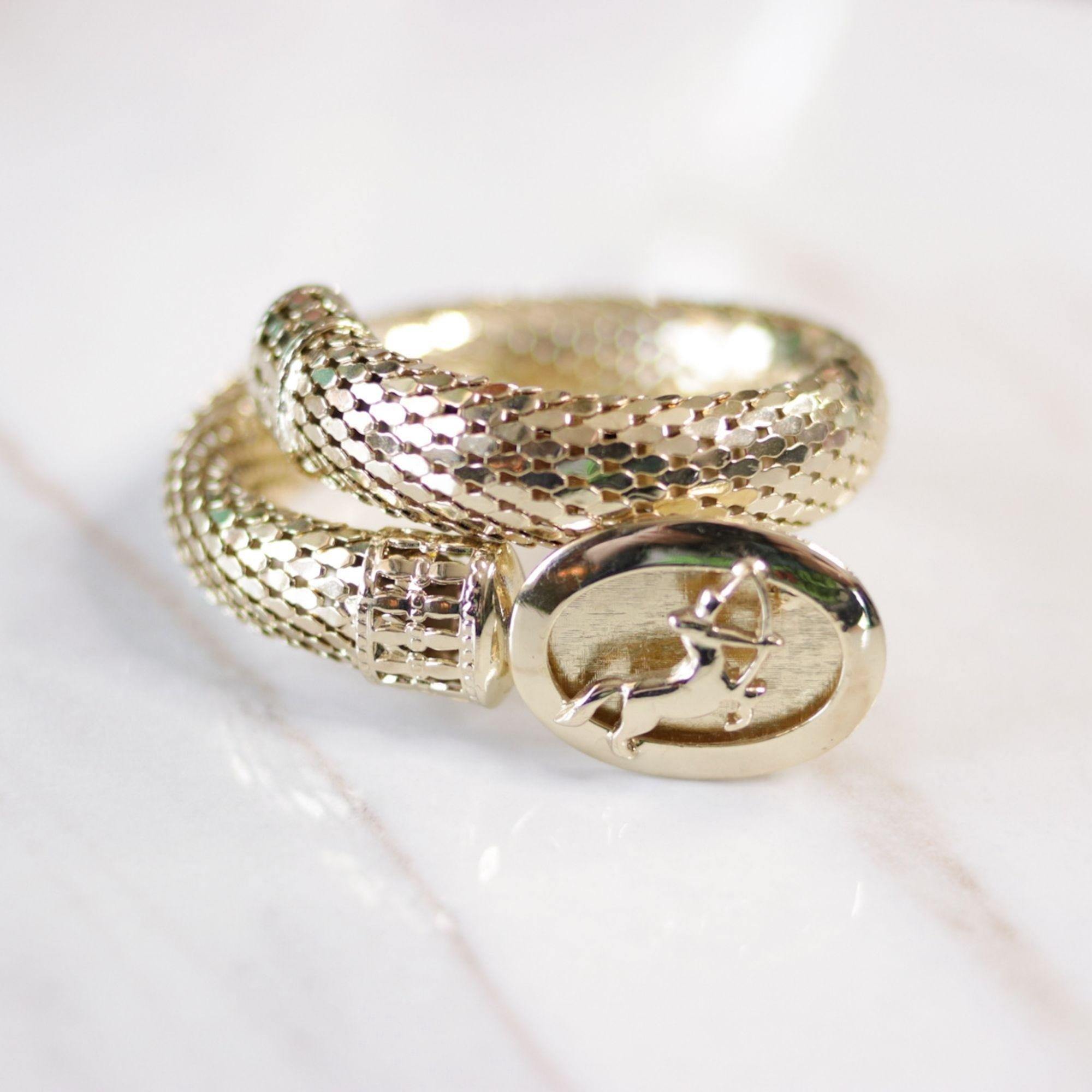 Vintage Whiting and Davis Sagittarius  Zodiac Sign Gold Mesh Coil Bracelet by Whiting and Davis - Vintage Meet Modern Vintage Jewelry - Chicago, Illinois - #oldhollywoodglamour #vintagemeetmodern #designervintage #jewelrybox #antiquejewelry #vintagejewelry