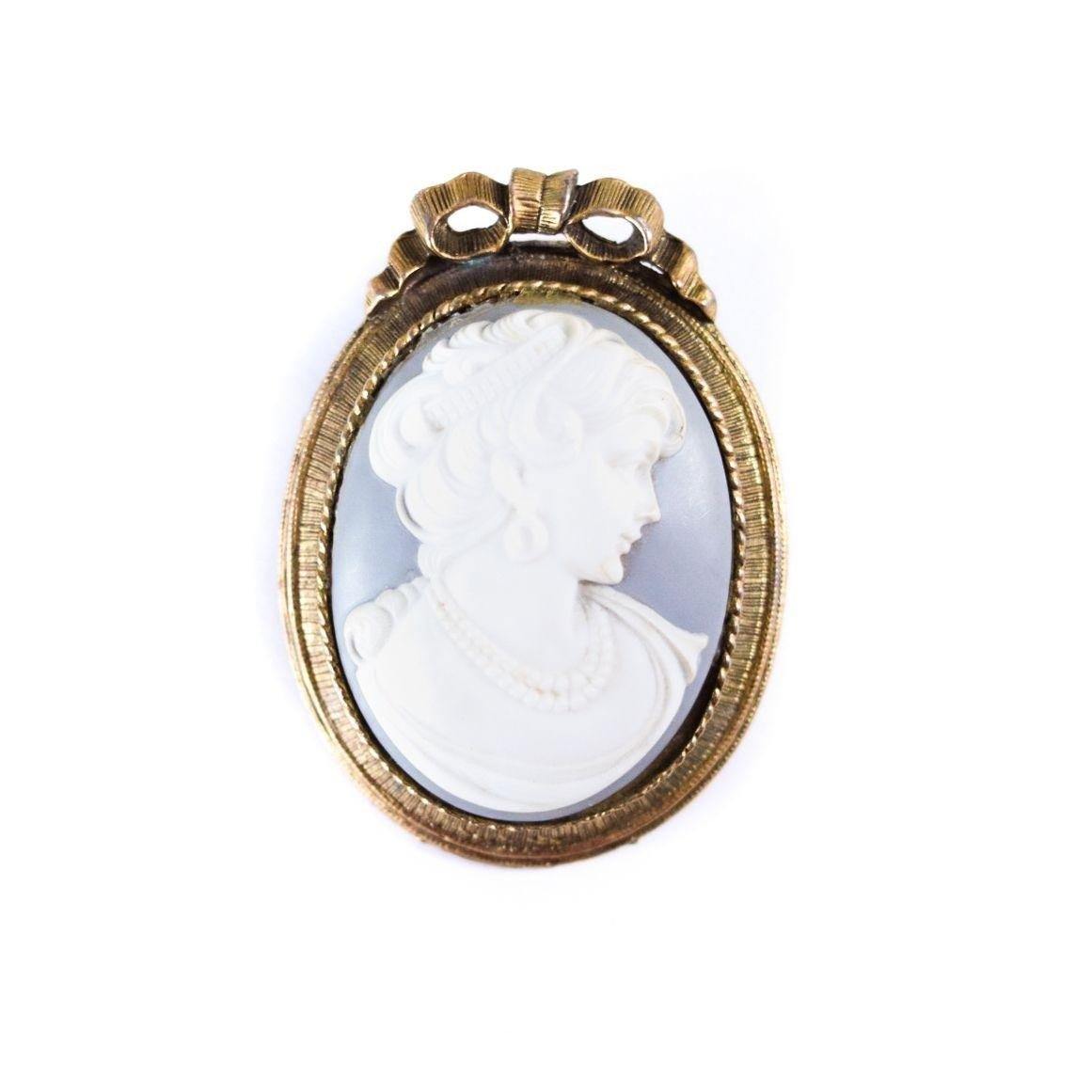 Vintage Blue and White Wedgewood Cameo Brooch with Gold Frame with Ribbon by Unsigned Beauty - Vintage Meet Modern Vintage Jewelry - Chicago, Illinois - #oldhollywoodglamour #vintagemeetmodern #designervintage #jewelrybox #antiquejewelry #vintagejewelry