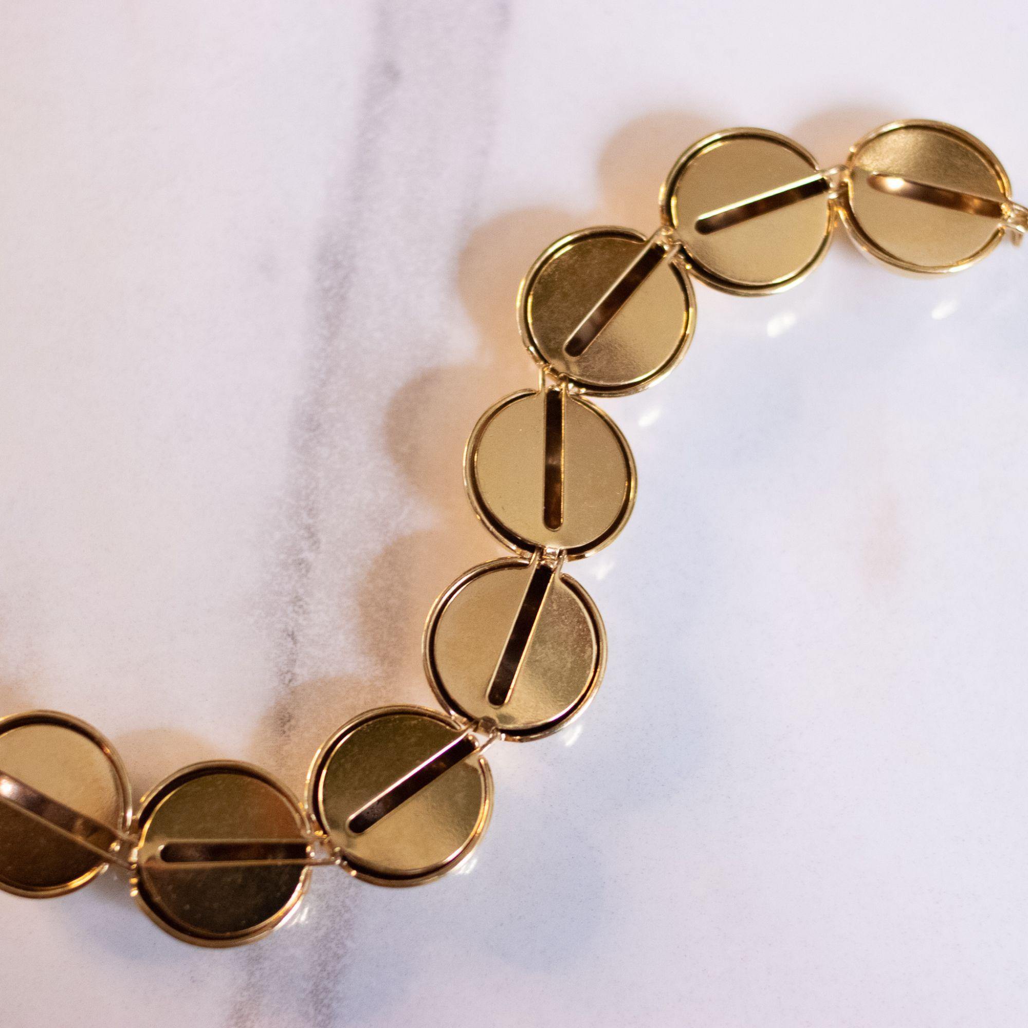 Vintage Monet Gold Disc Link Bracelet by Monet - Vintage Meet Modern Vintage Jewelry - Chicago, Illinois - #oldhollywoodglamour #vintagemeetmodern #designervintage #jewelrybox #antiquejewelry #vintagejewelry