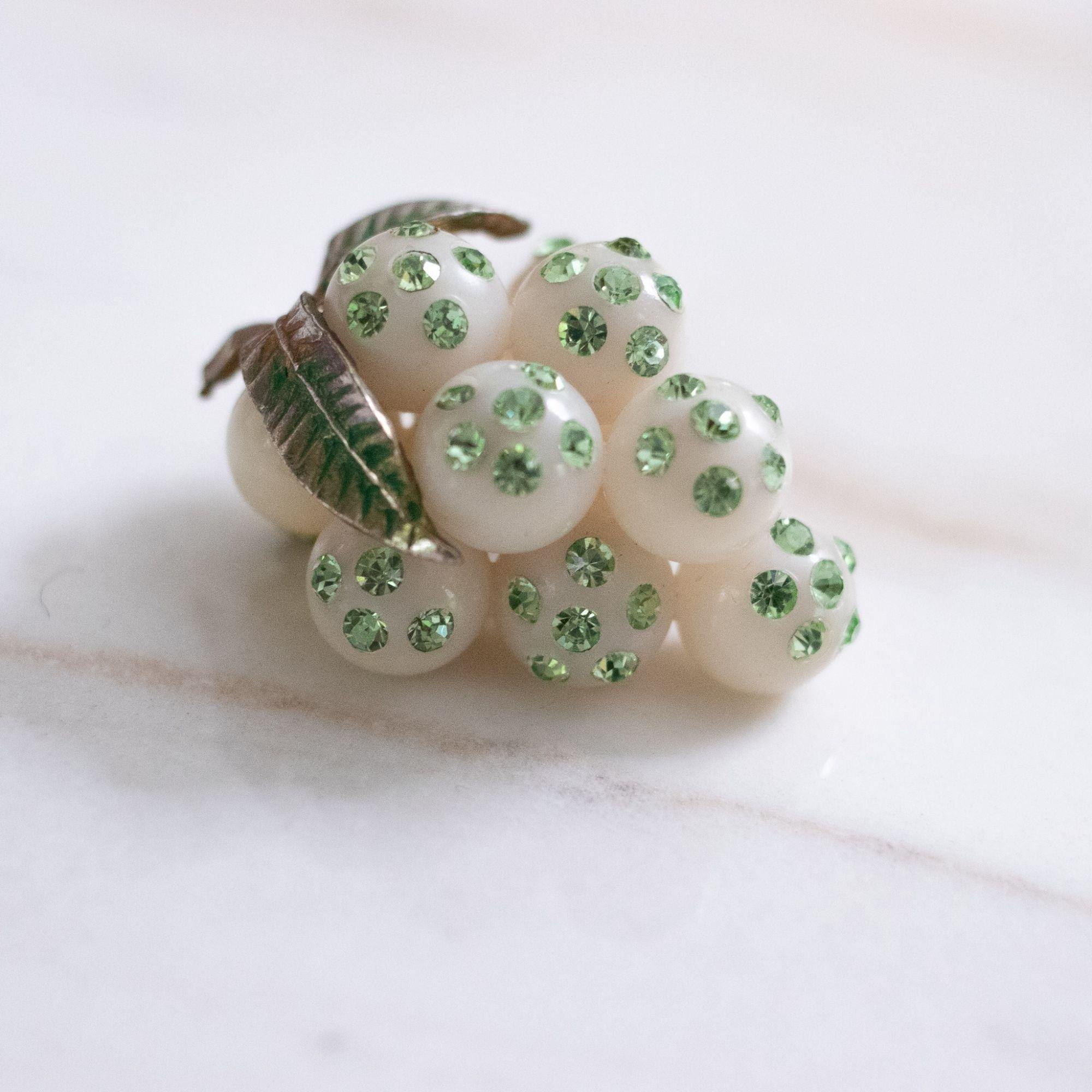 Vintage White Grape Brooch with Green Rhinestones by Unsigned Beauty - Vintage Meet Modern Vintage Jewelry - Chicago, Illinois - #oldhollywoodglamour #vintagemeetmodern #designervintage #jewelrybox #antiquejewelry #vintagejewelry