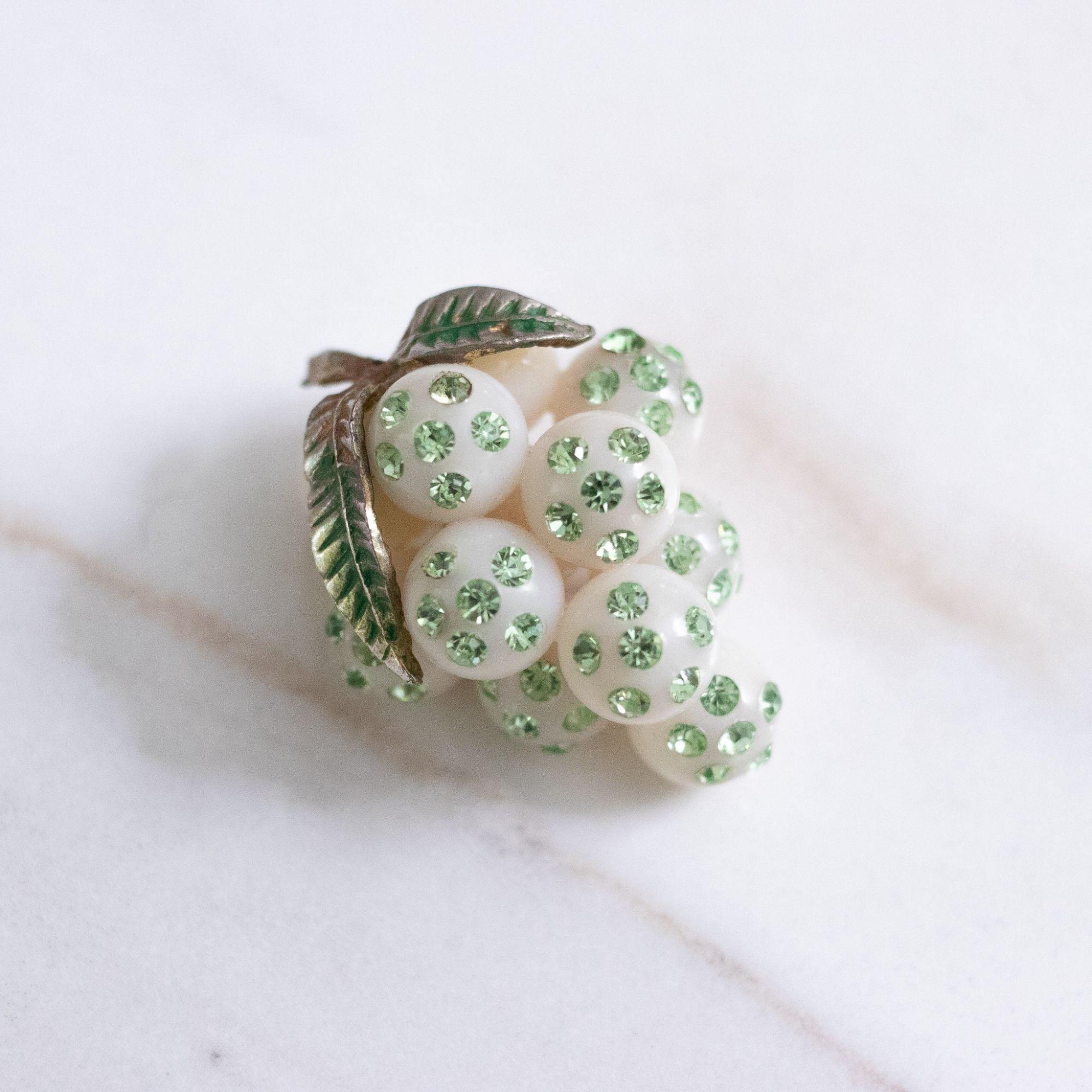 Vintage White Grape Brooch with Green Rhinestones by Unsigned Beauty - Vintage Meet Modern Vintage Jewelry - Chicago, Illinois - #oldhollywoodglamour #vintagemeetmodern #designervintage #jewelrybox #antiquejewelry #vintagejewelry