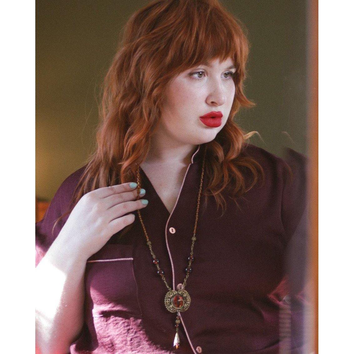 Vintage Long Art Deco Amber Glass Necklace with Brass Accent with Serpent by Czech - Vintage Meet Modern Vintage Jewelry - Chicago, Illinois - #oldhollywoodglamour #vintagemeetmodern #designervintage #jewelrybox #antiquejewelry #vintagejewelry