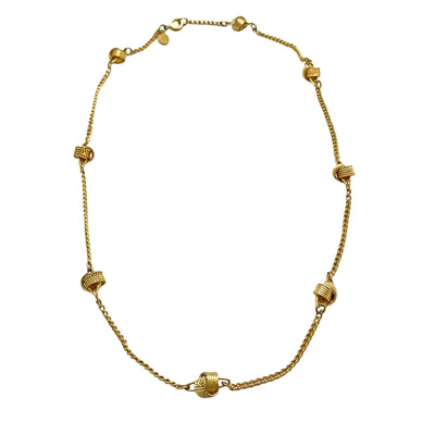 Vintage Avon Gold Knot Necklace by Avon - Vintage Meet Modern Vintage Jewelry - Chicago, Illinois - #oldhollywoodglamour #vintagemeetmodern #designervintage #jewelrybox #antiquejewelry #vintagejewelry