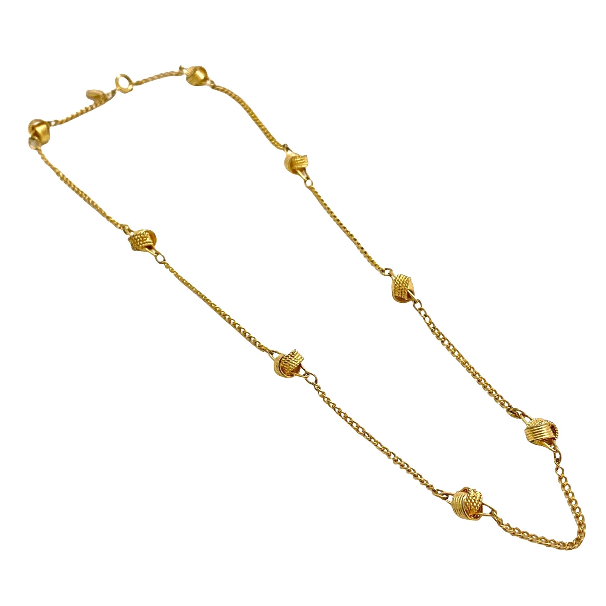 Vintage Avon Gold Knot Necklace by Avon - Vintage Meet Modern Vintage Jewelry - Chicago, Illinois - #oldhollywoodglamour #vintagemeetmodern #designervintage #jewelrybox #antiquejewelry #vintagejewelry