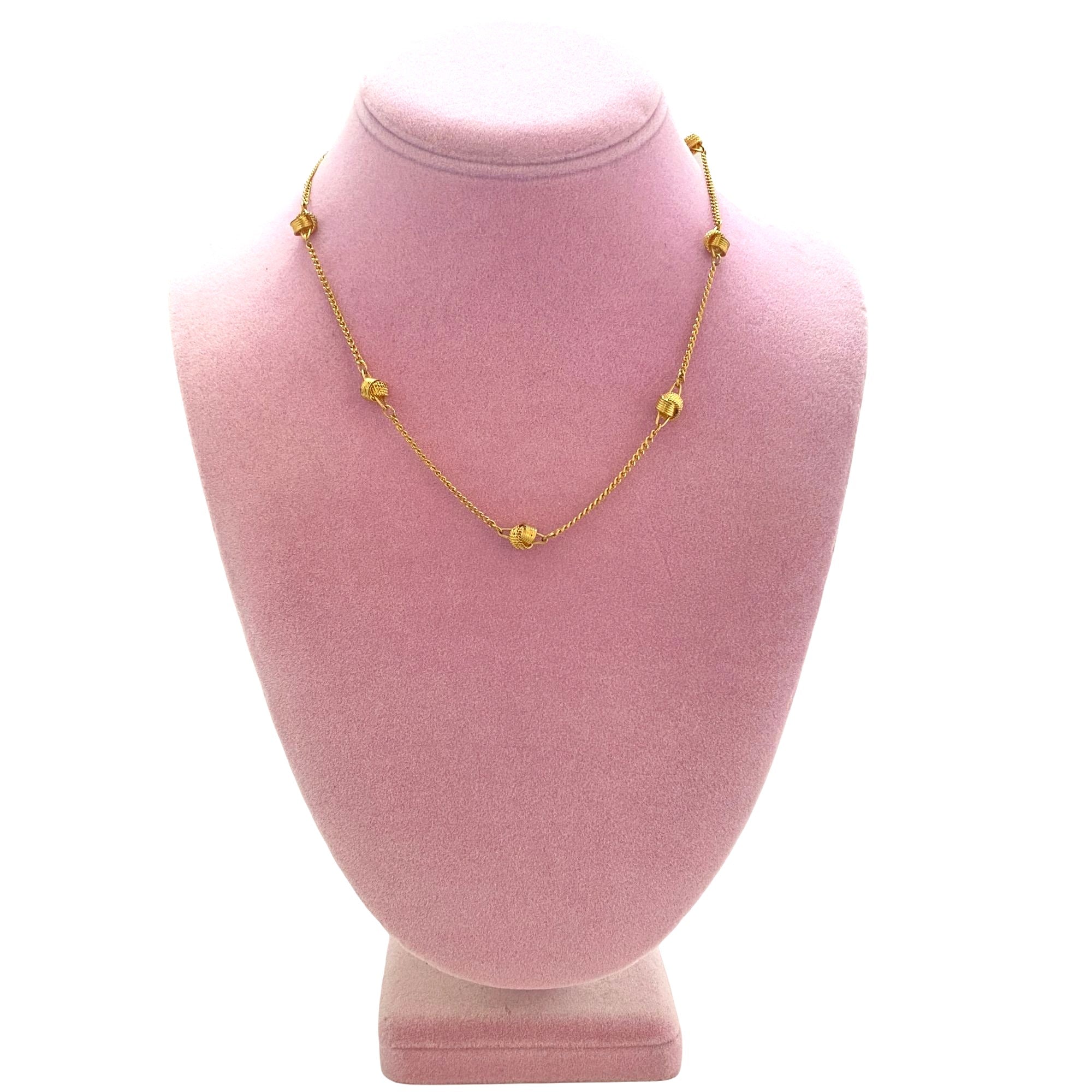 Vintage Avon Gold Knot Necklace by Avon - Vintage Meet Modern Vintage Jewelry - Chicago, Illinois - #oldhollywoodglamour #vintagemeetmodern #designervintage #jewelrybox #antiquejewelry #vintagejewelry