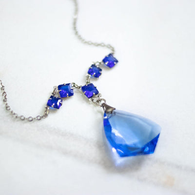 Vintage Art Deco Blue Crystal Lavalier Necklace by Art Deco Era - Vintage Meet Modern Vintage Jewelry - Chicago, Illinois - #oldhollywoodglamour #vintagemeetmodern #designervintage #jewelrybox #antiquejewelry #vintagejewelry